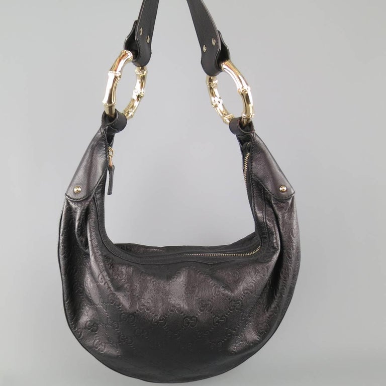 GUCCI Black Monogram Embossed Leather Gold Bamboo Handle Hobo Handbag at 1stdibs