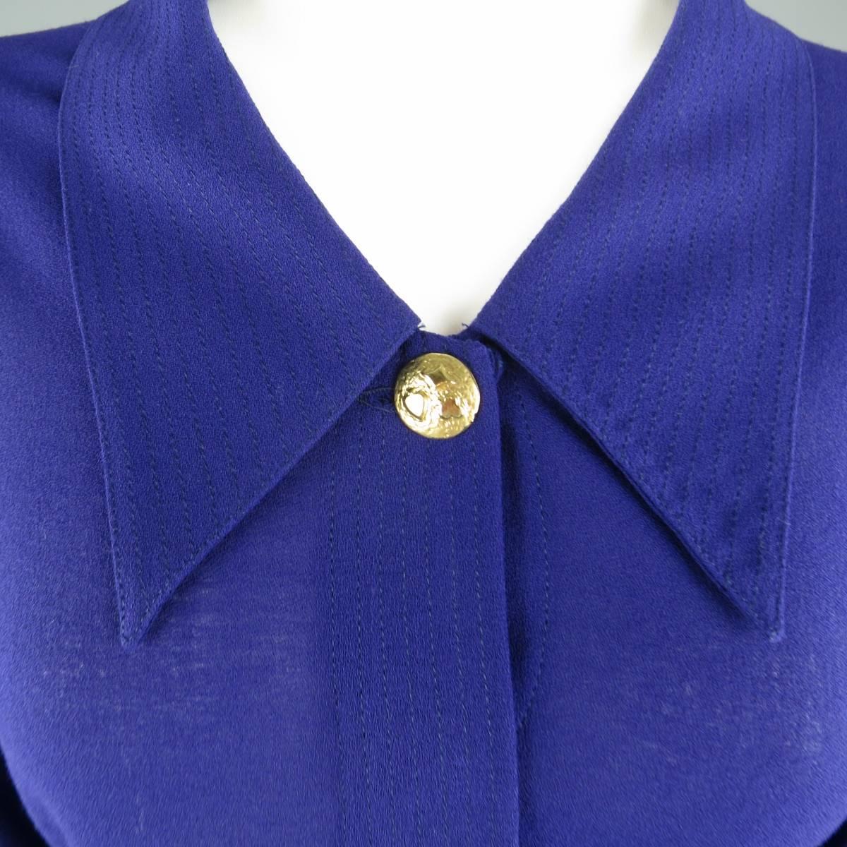 Fabulous vintage 1980's GIANNI VERSACE blouse comes in a purple crepe fabric and features an oversized pointed collar, hidden placket button closure front, and French cuffs with yellow gold tone heart, club, and diamond playing card symbol button