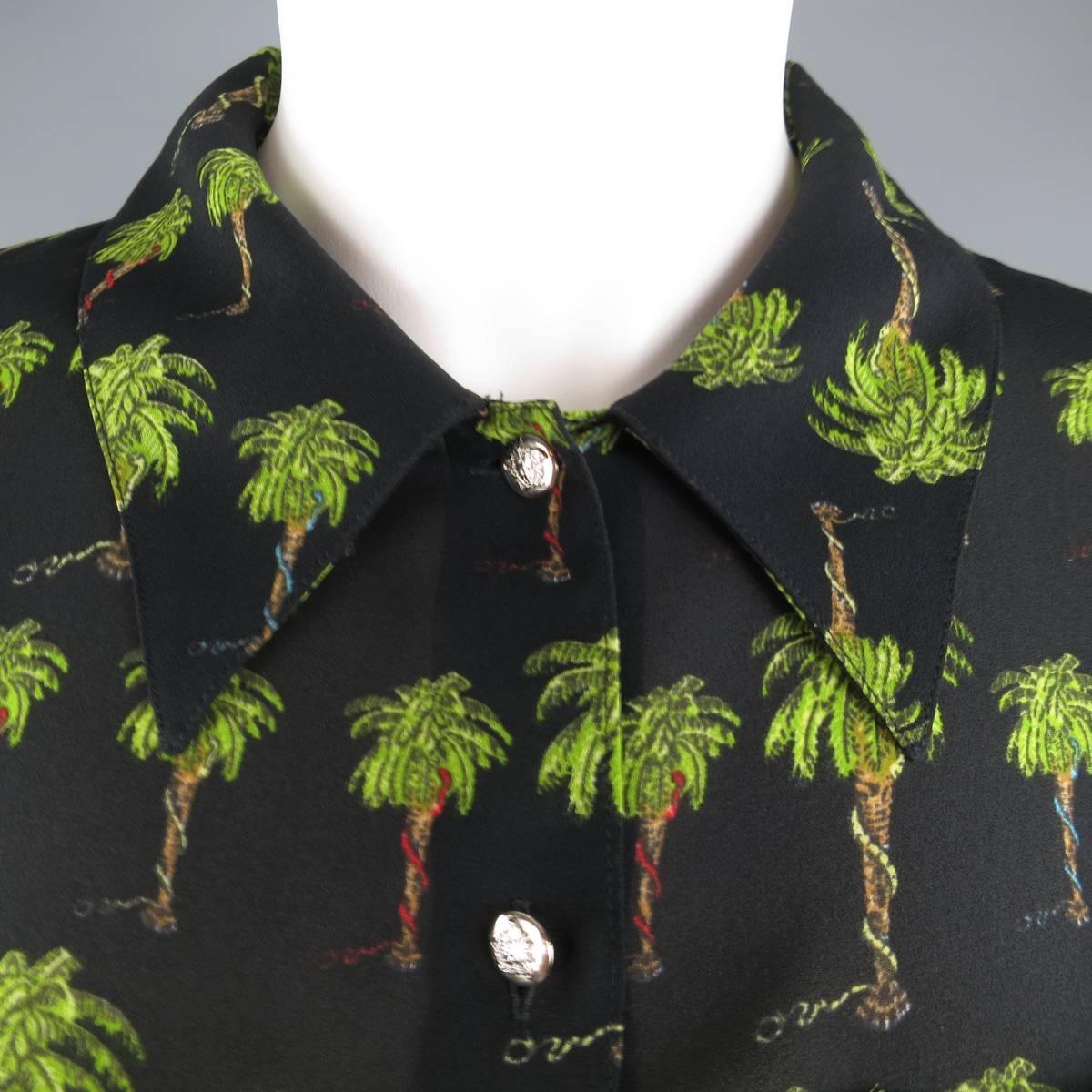Vintage 1990's VERSACE JEANS COUTURE blouse comes in black chiffon with green snake in palm tree print with a pointed collar, batch breast pockets, and silver tone Medusa head buttons. Care/size tags removed.
 
Excellent Pre-Owned Condition.
Marked: