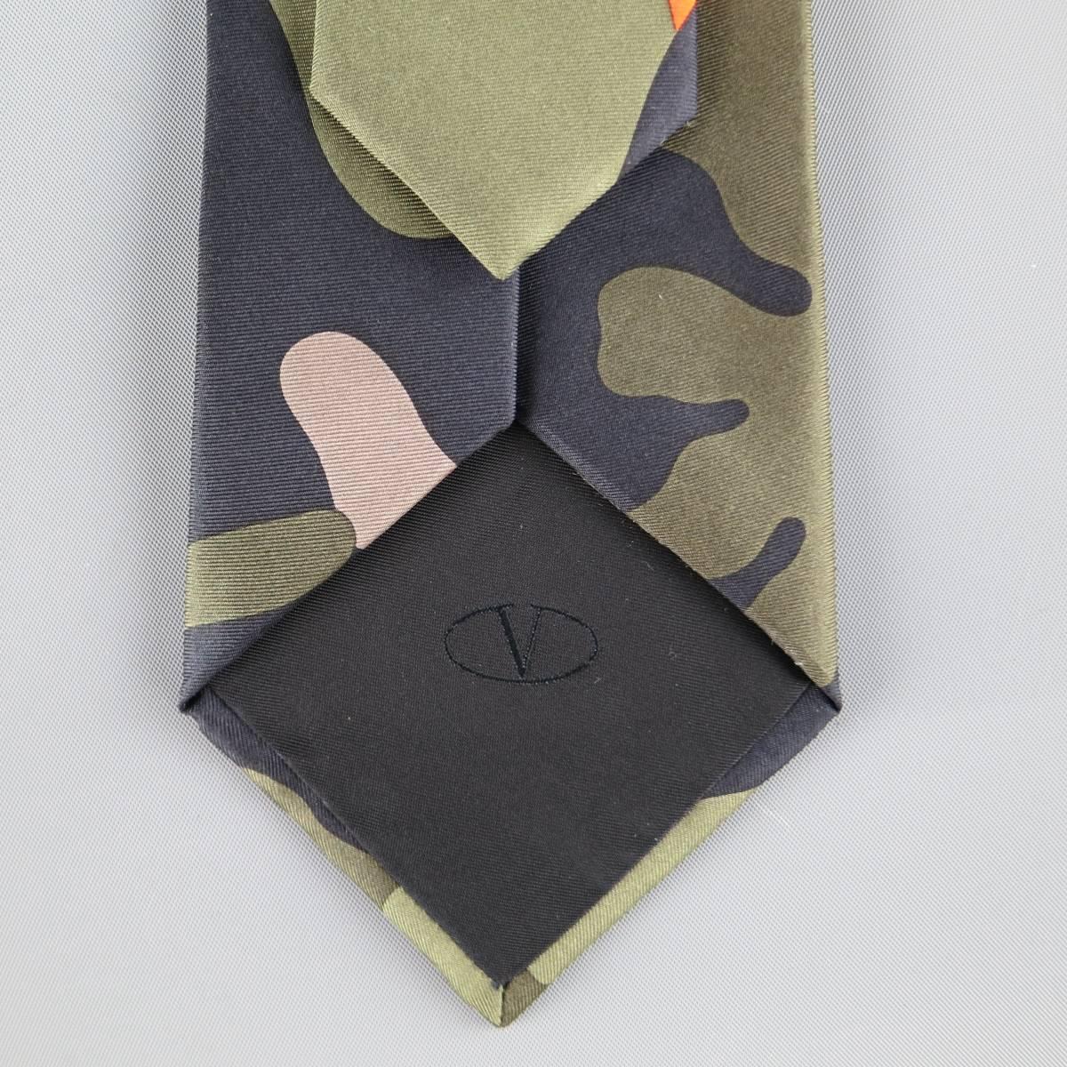 Gray VALENTINO dress tie comes in large scale camouflage print with hues of olive gre