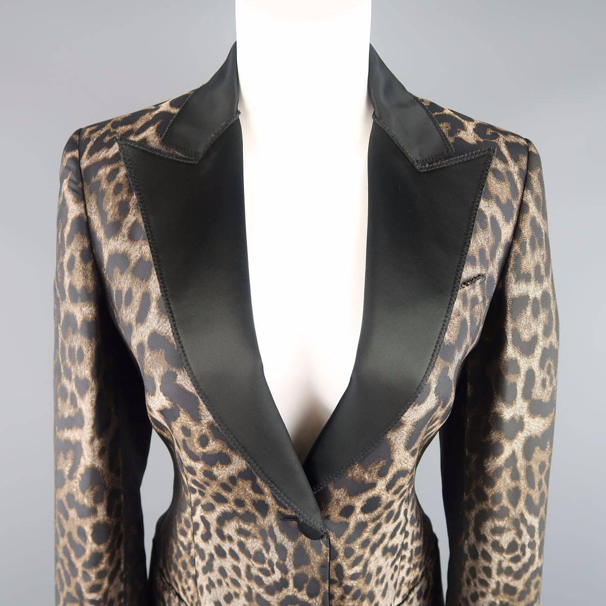 LANVIN tuxedo style jacket comes in a dark taupe beige leopard cheetah print silk blend fabric and features a black satin peak lapel, single button closure, and raw edge detailed pockets. Made in Italy. Fall 2013.
 
Excellent Pre-Owned