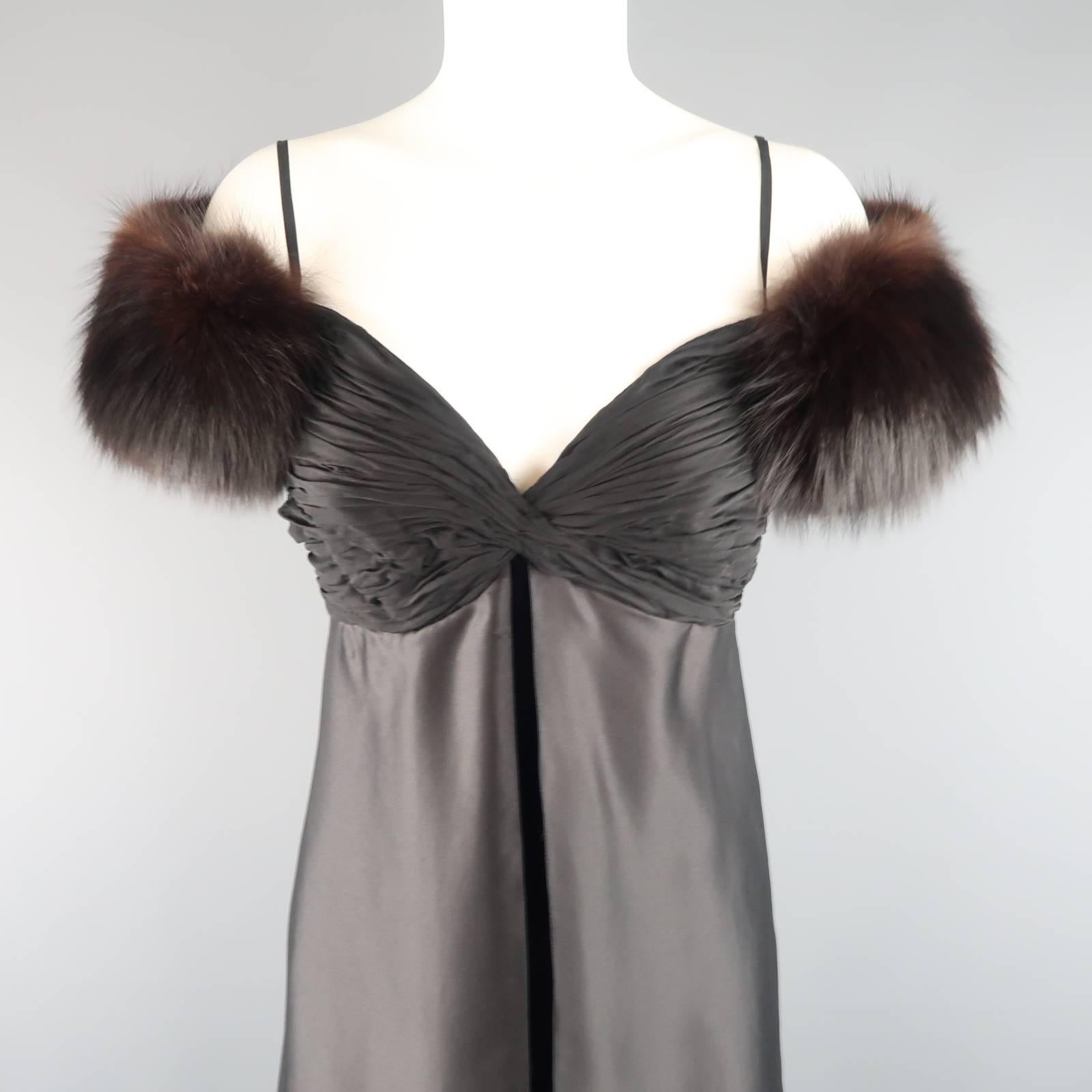 This fabulous vintage MICHAEL CASEY COUTURE evening gown features a gathered silk bust, velvet sheath with silk satin flowing overlay, and brown fox fur shoulder straps. Wear throughout silk. As-Is. Made in USA.
 
Good Pre-Owned Condition.
Marked: