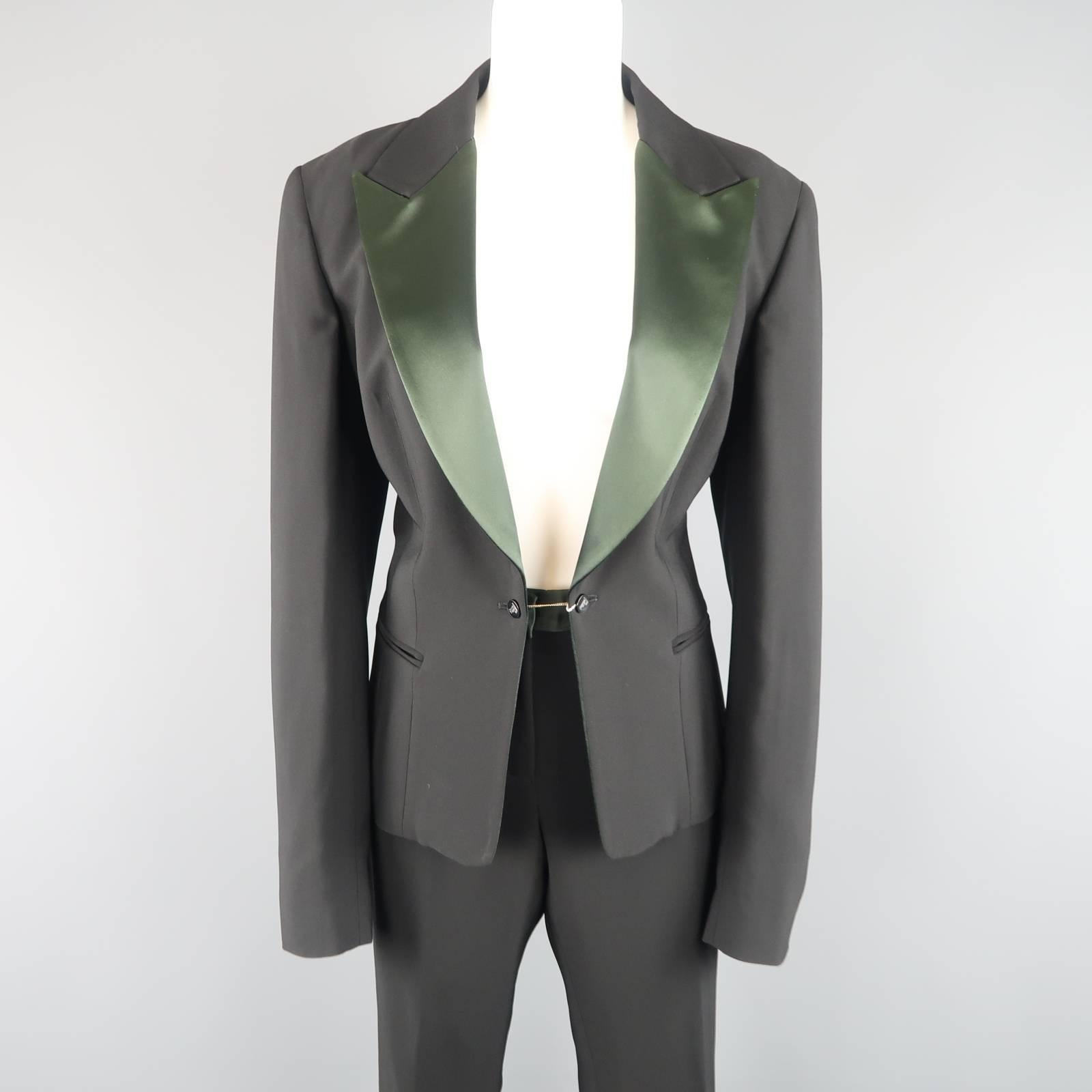 Fabulous GIANFANCO FERRE tuxedo comes in a rayon blend crepe textured fabric and includes a tailored jacket with green satin peak lapel and chain closure and  matching trousers with green waistband and side stripe. Made in Italy.
 
New with Tags.