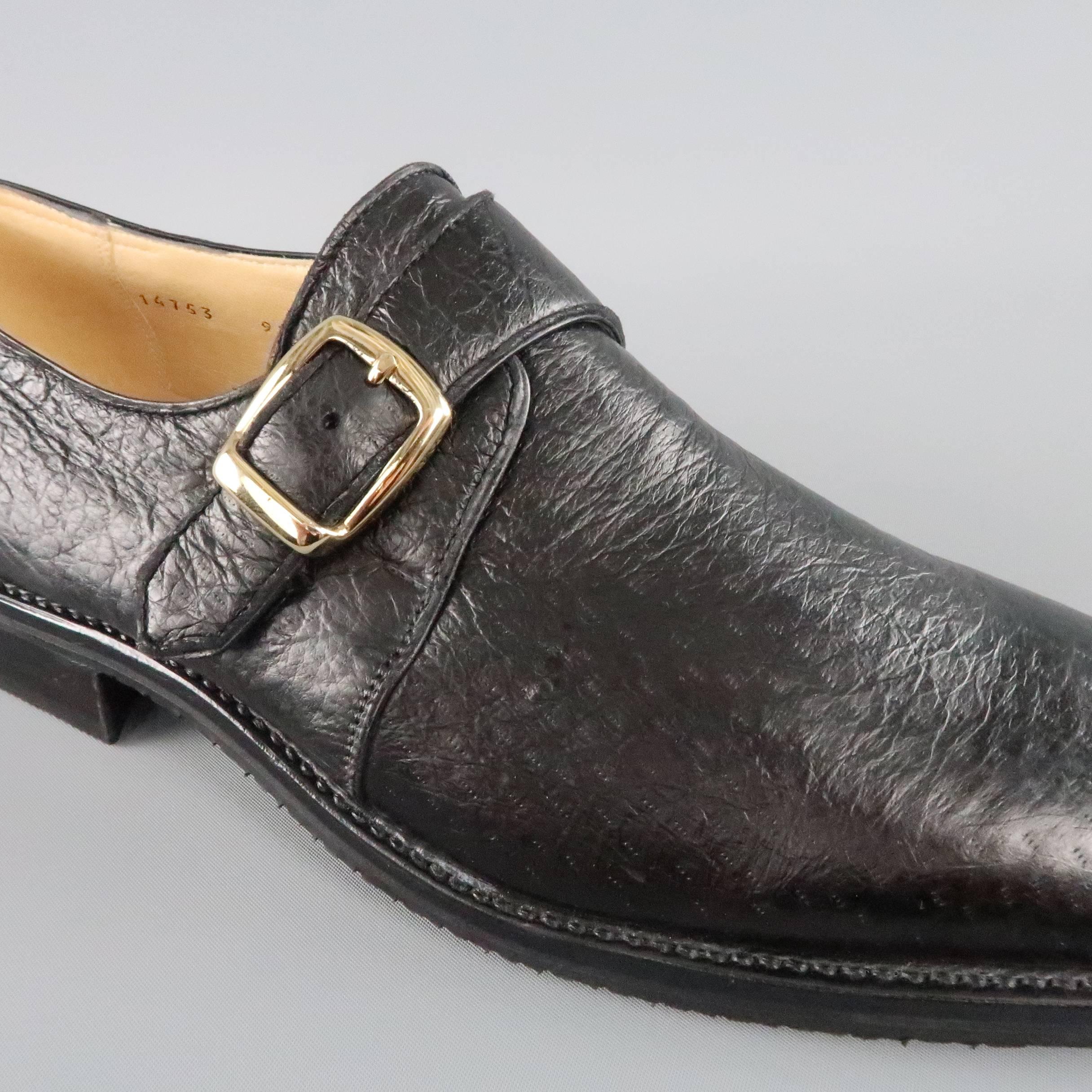 GRAVATI dress shoes come in textured black leather with a squared off tapered toe, and single monk strap with gold tone buckle. With Box. Hand Made in Italy.
 
New in Box.
Marked:9.5 M
 
Outsole: 12 x 4 in.

SKU: 81868