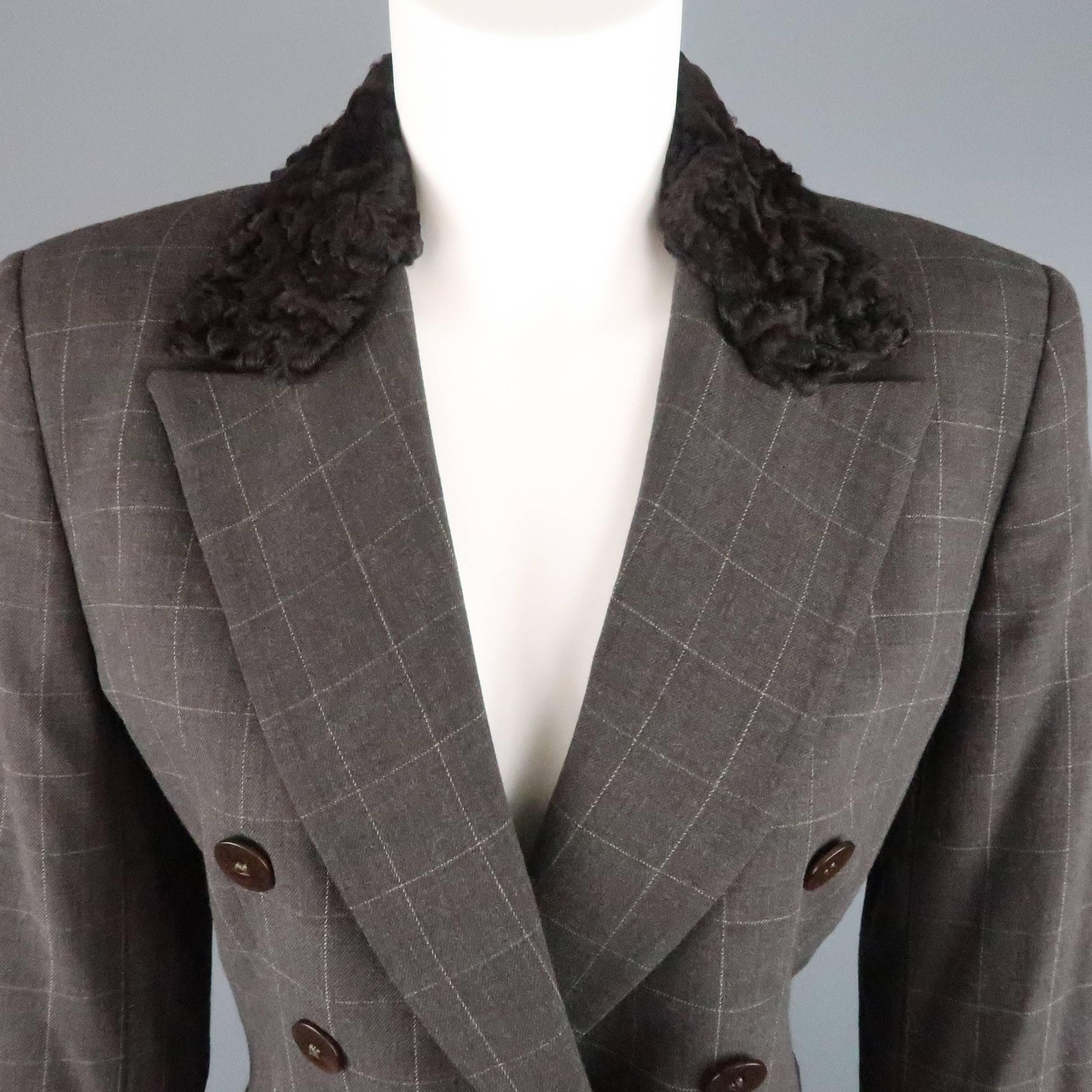 Le COLLEZIONI by GIORGIO ARMANI double breasted sport coat comes in a muted taupe windowpane print wool and features a peak lapel with fur collar. Made in Italy.
 
Good Pre-Owned Condition.
Marked: 40 / 6
 
Measurements:
 
Shoulder: 16 in.
Bust: 40