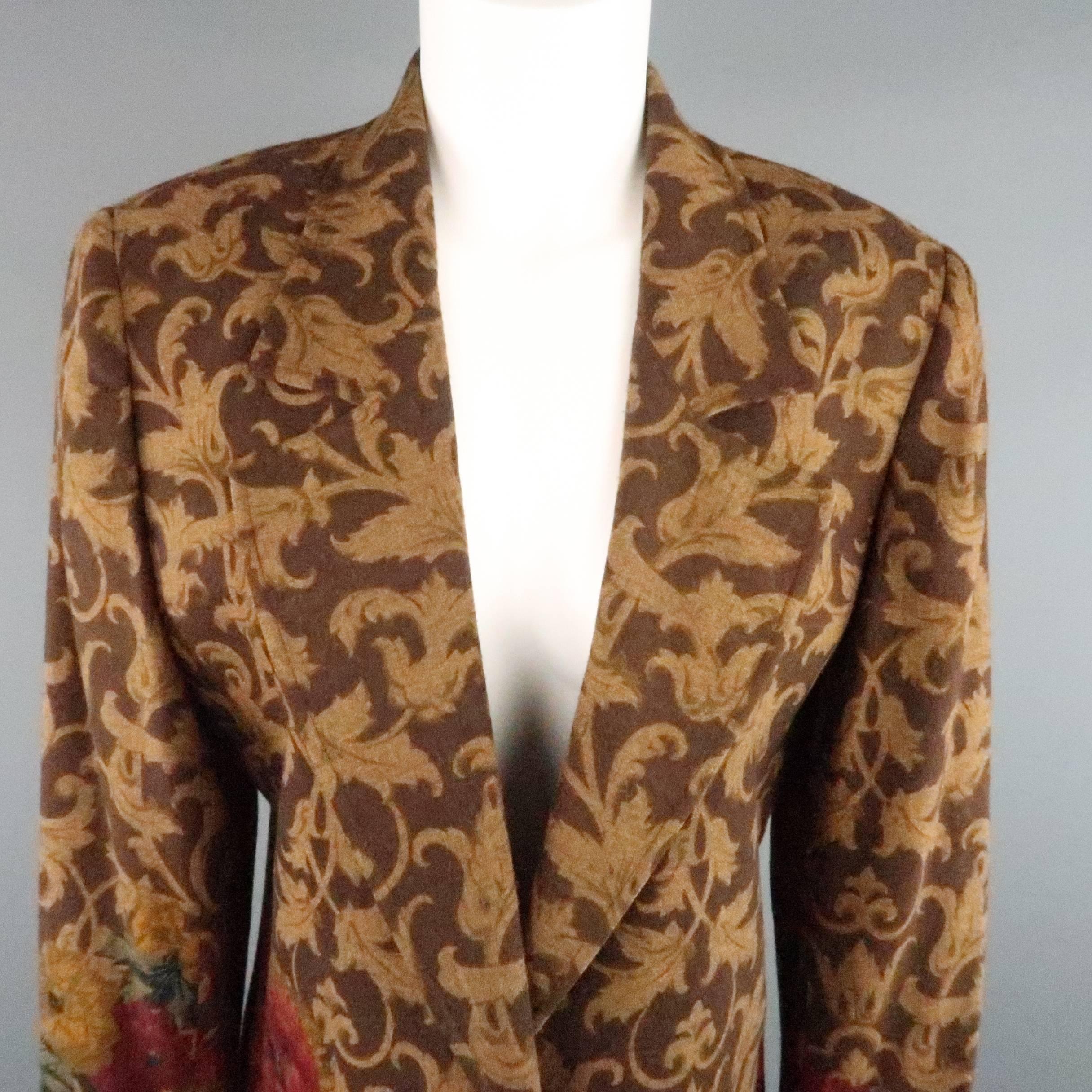 Vintage 1990's VALENTINO Miss V blazer comes in a gorgeous brown and tan baroque print wool with red rose floral print lower mid section and features an open front, wide notch lapel, slit pockets, and satin liner. Made in Italy.
 
Good Pre-Owned
