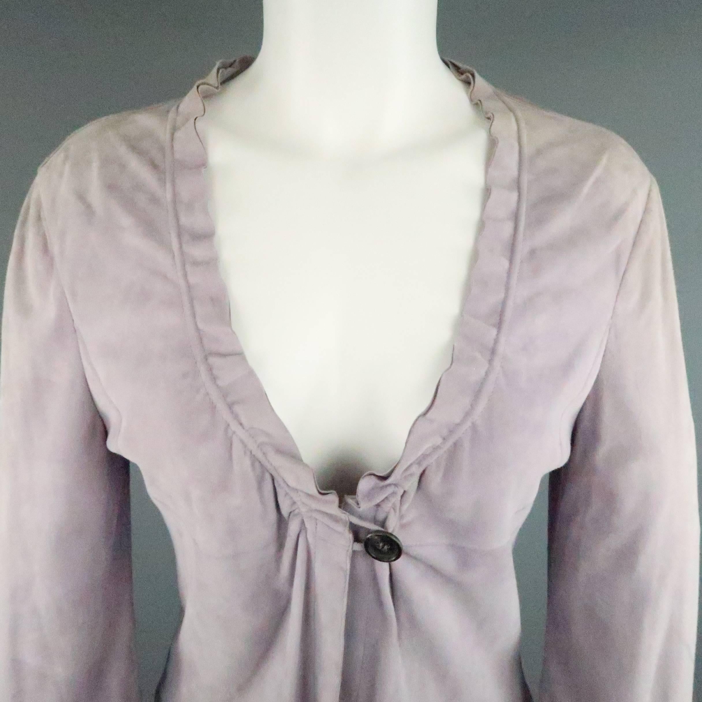 GIORGIO ARMANI cardigan jacket comes in a light weight lavender nubuck suede leather and features a single button closure, empire waist with underbust seam, and ruffled trim. Discoloration throughout suede. As-Is. Made In Italy.
 
Fair Pre-Owned