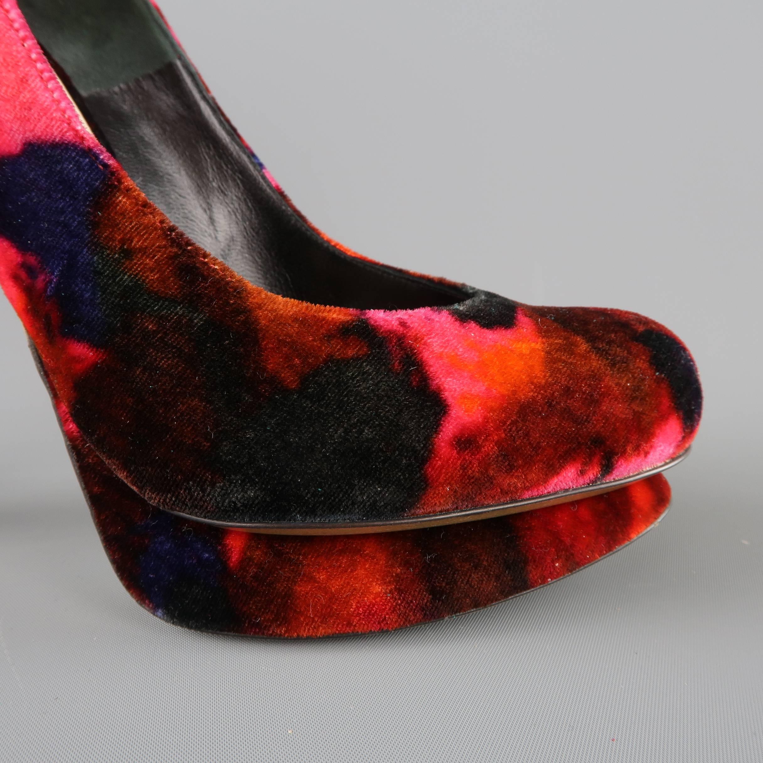 NICHOLAS KIRKWOOD for ERDEM pumps come in a vibrant fuchsia red floral print velvet with hues of black, navy, and orange and features a structural, covered platform, covered stiletto heel, and ankle strap. Worn Once. Made in Italy.
 
Excellent