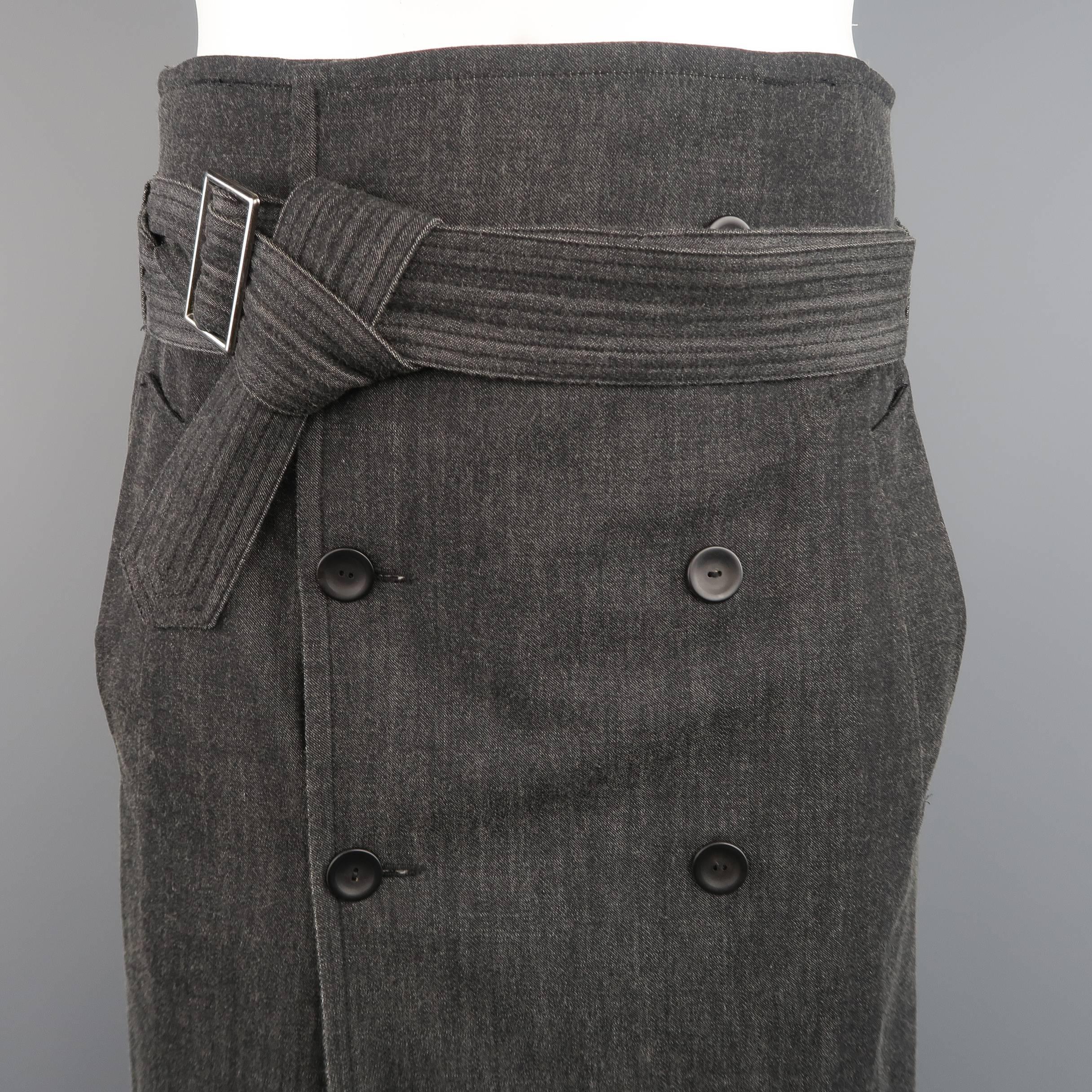 Vintage GAULTIER2 by JEAN PAUL GAULTIER kilt comes in charcoal gray rayon denim and features a double breasted trench coat inspired closure, slanted pockets, and belted waist with bondage straps. Made in Italy.
 
Excellent Pre-Owned