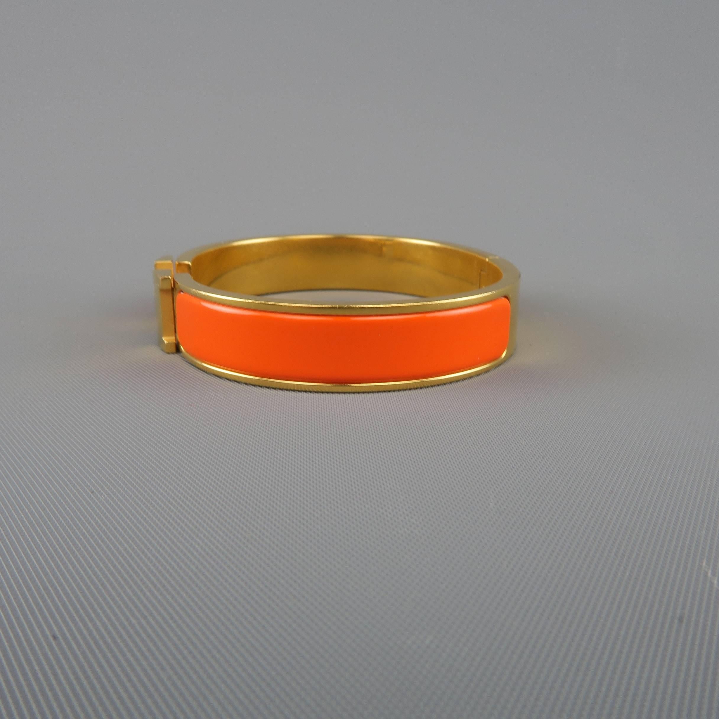 orange and gold hermes bracelet