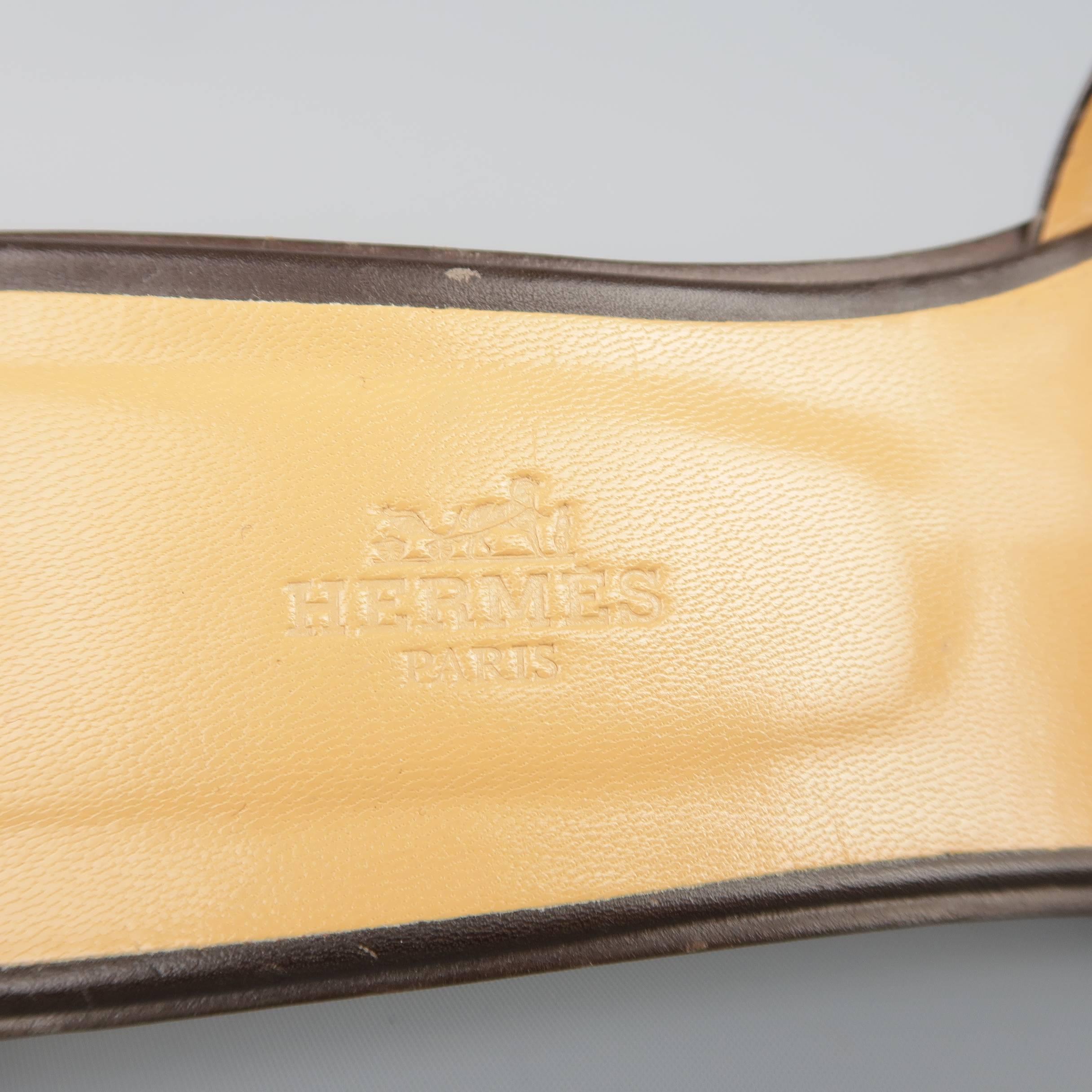 HERMES Size 10 Brown Studded Leather ORAN H Flat Strap Sandals In New Condition In San Francisco, CA
