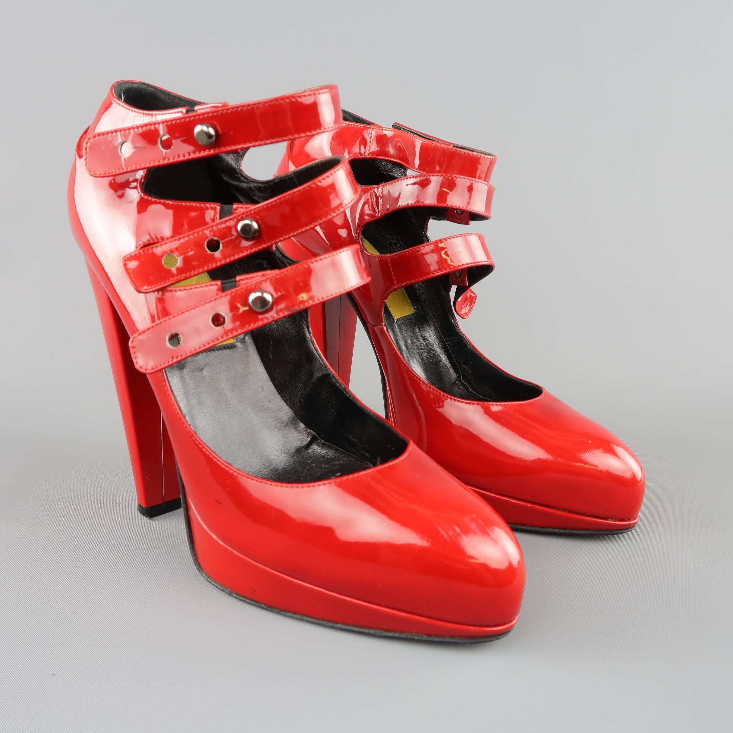 LANVIN funway pumps come in bold red patent leather and feature a pointed toe, chunky covered heel, and triple Mary Jane straps. Scuffs shown in detail shots. As-Is. Made in Italy.
 
Fair Pre-Owned Condition.
Marked: IT 36
 
Heel: 5 in.
Platform: 1