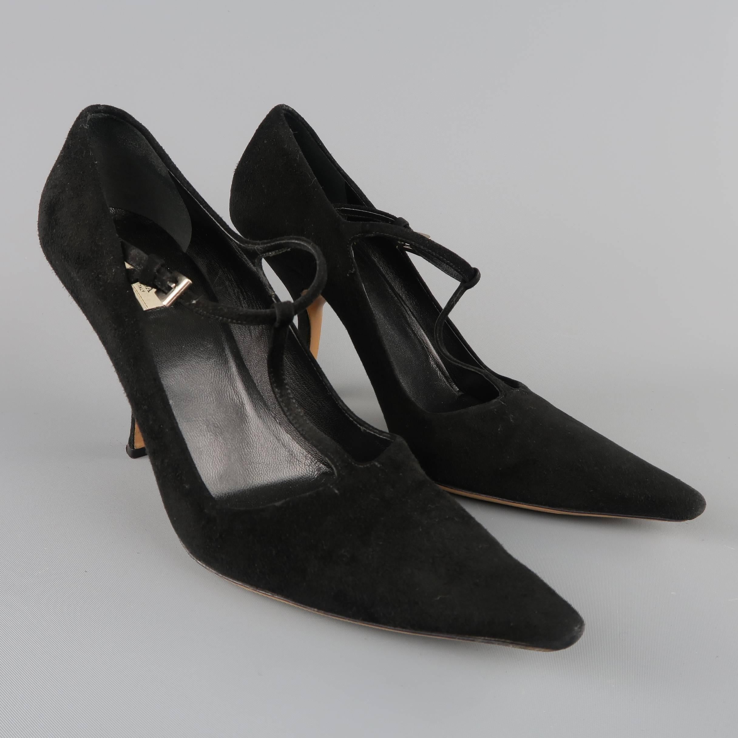 PRADA pumps come in black suede and feature a pointed toe, T strap with silver tone buckle, and unique angular curved heel. Made in Italy.
 
Good Pre-Owned Condition.
Marked: IT 38
 
Heel: 3.5 in.

SKU: 84283