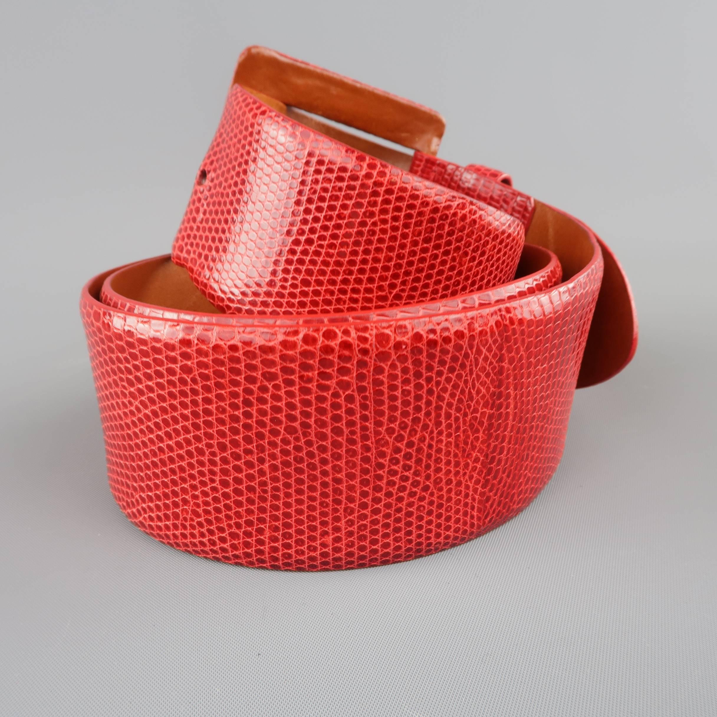 RALPH LAUREN COLLECTION waist belt comes in red lizard skin leather and features a large covered buckle with gold tone hardware. Made in Italy.
 
Good Pre-Owned Condition.
Marked: L
 
Length: 42 in.
Width: 1.85 in.
Fits: 35-39 in.


SKU: 85490