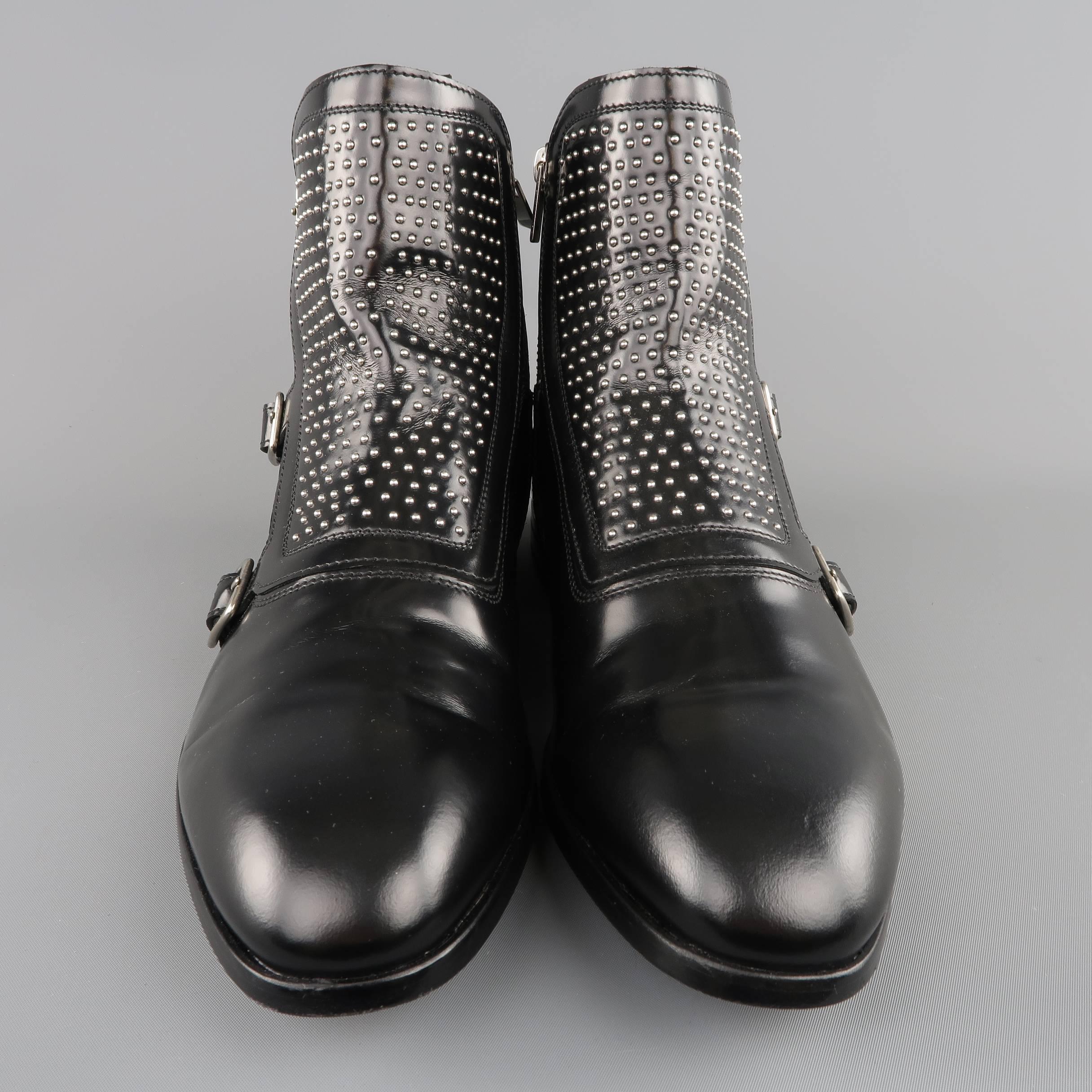 ALEXANDER MCQUEEN ankle boots come in smooth black leather and feature a squared point toe, and triple buckle silver tone studded monk strap. With box. Made in Italy.
 
Good Pre-Owned Condition.
Marked: IT 42
 
Height: 5.5 in.
Outsole: 11.75 x 4