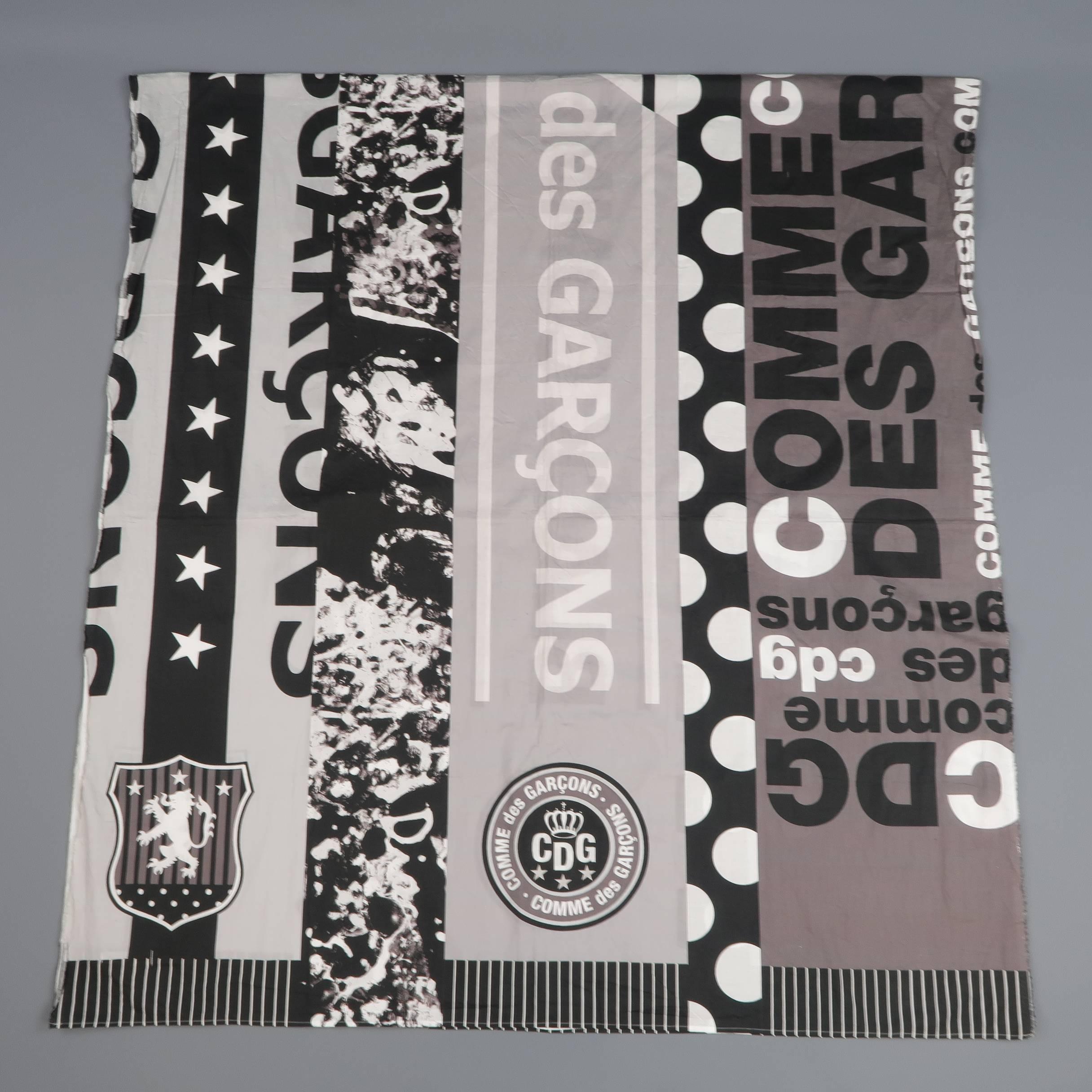 Oversized COMME des GARCONS blanket scarf comes in a light weight cotton with abstract logo stripe graphic print and frayed edges. Made in Japan.
 
Good Pre-Owned Condition.
 
92.5 x 44 in.

SKU: 67427