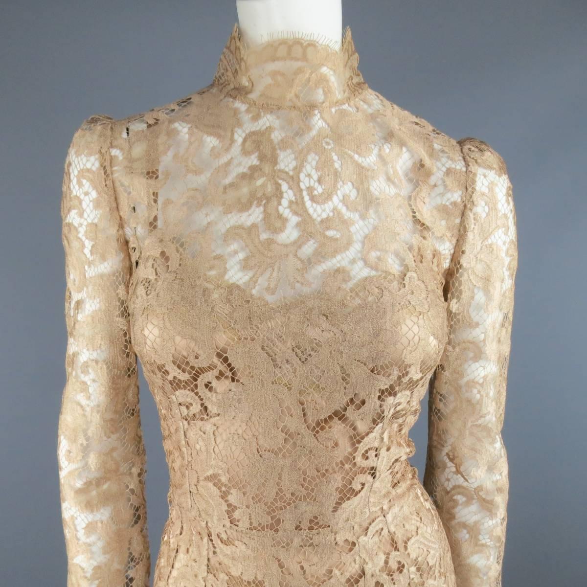 DOLCE & GABBANA cocktail dress in a peachy beige lace featuring a high mock neck, long sleeves, fitted silhouette, and built in stretch satin slip liner. Tags removed by consignor. Otherwise excellent condition. As-Is. Made in Italy.
 
Good