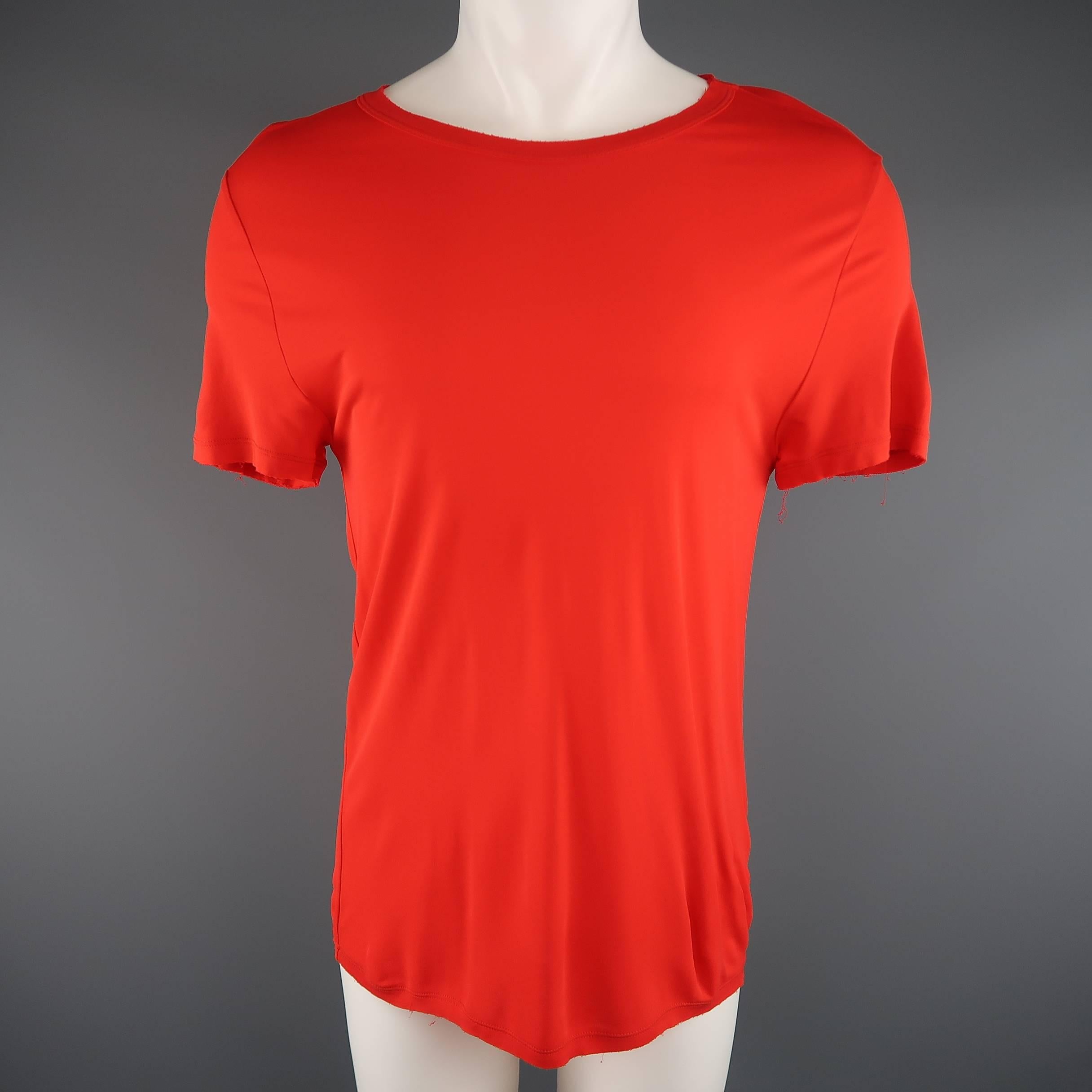 JEAN PAUL GAULTIER Soleil T-shirt comes in bright orange red opaque chiffon and features a round neckline, frayed trim, and fishnet mesh X on back. Made in Italy.
 
Excellent Pre-Owned Condition.
Marked: M
 
Measurements:
 
Shoulder: 17 in.
Chest: