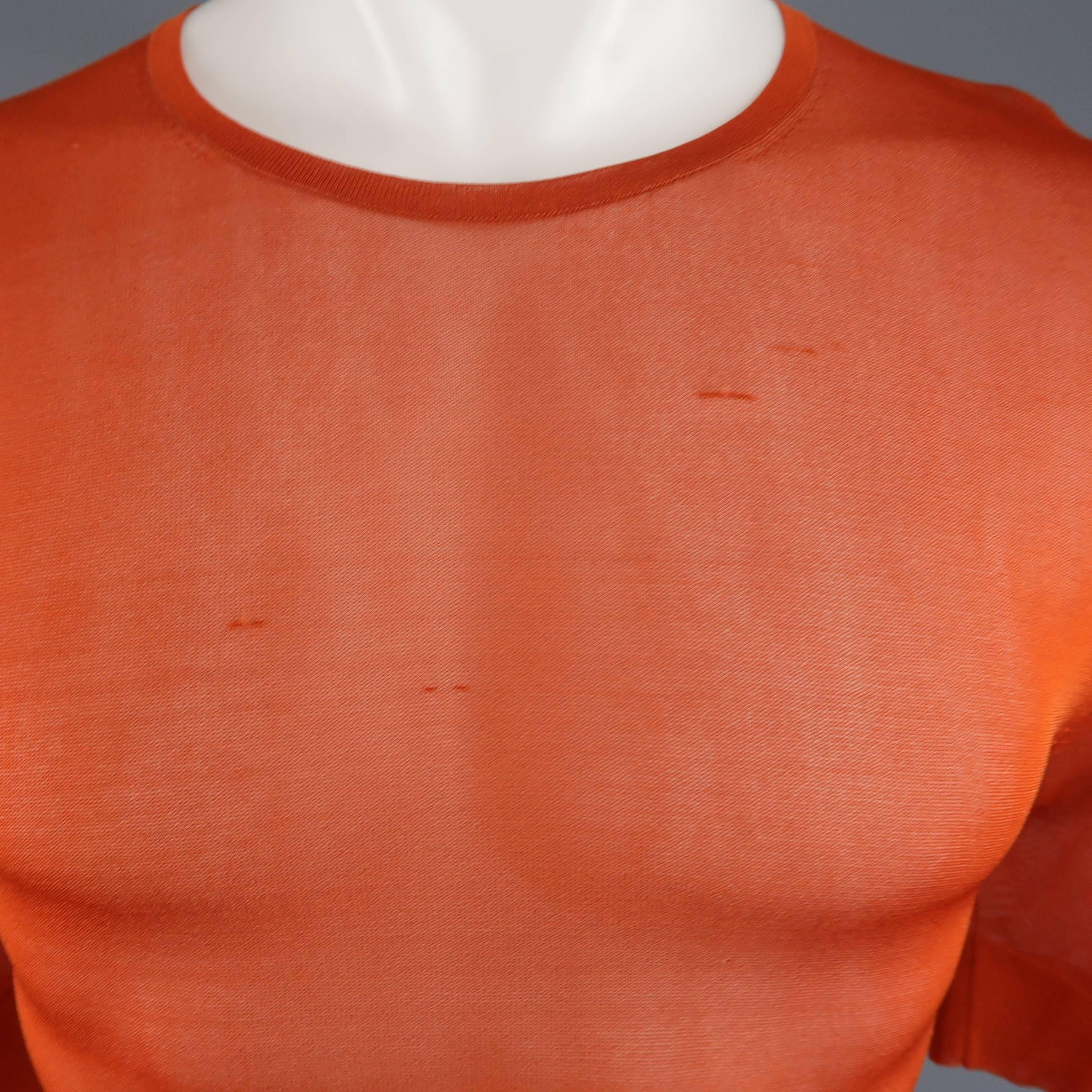 DRIES VAN NOTEN short sleeve pullover comes in a metallic burnt orange sheer mesh knit with a round neck and thick bands. Minor imperfections. As-Is. Made in Belgium.
 
Good Pre-Owned Condition.
Marked: Large
 
Measurements:
 
Shoulder: 18
