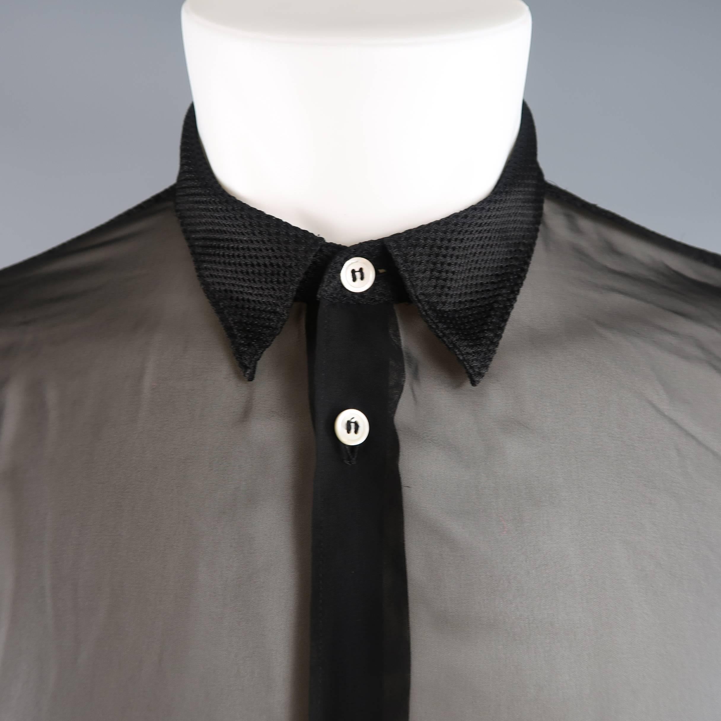 COMMES des GARCONS HOMME PLUS shirt features a sheer chiffon front with breast pocket, pointed mesh collar, striped mesh sleeves, and mesh back. Minor wear. Made in Japan.
 
Good Pre-Owned Condition.
Marked: M (AD 2013)
 
Measurements:
 
Shoulder: