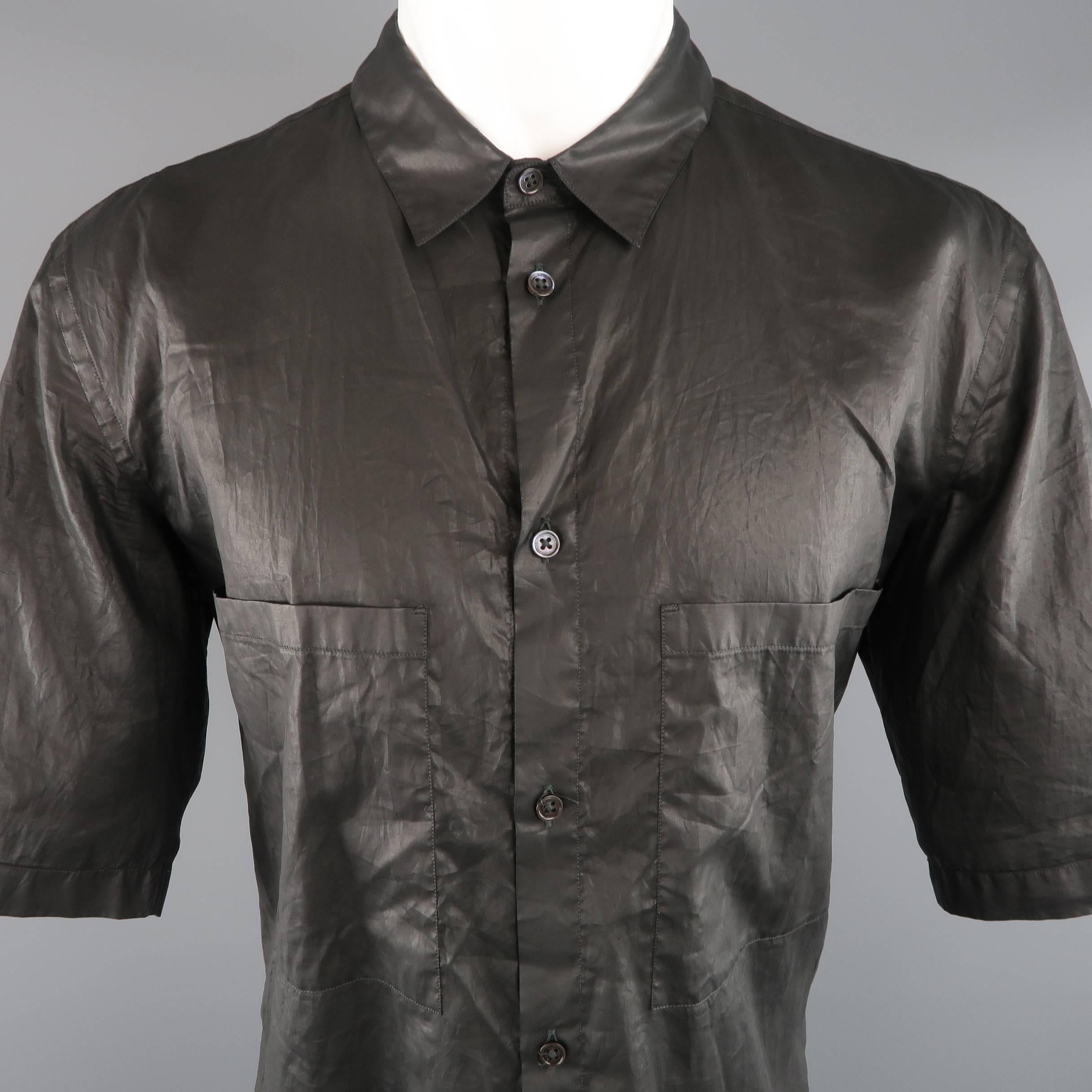 MARNI short sleeve button up shirt comes in a black wrinkle textured coated cotton with a pointed collar and patch chest pockets. Made in Italy.
 
Excellent Pre-Owned Condition.
Marked: IT 52
 
Measurements:
 
Shoulder: 20 in.
Chest: 48 in.
Sleeve: