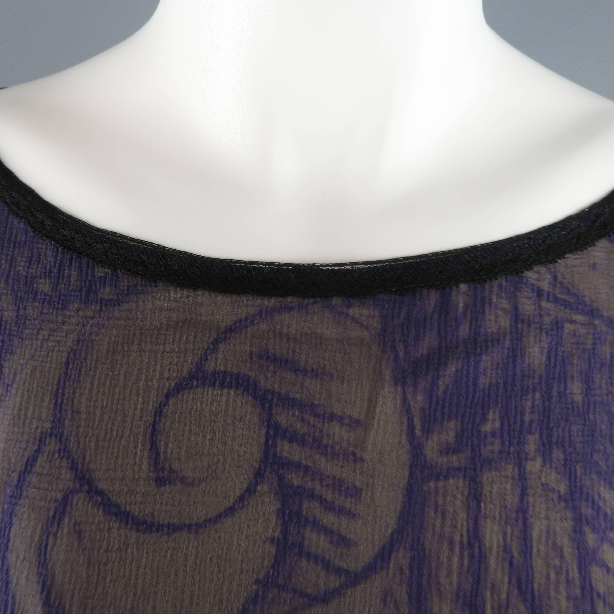CHANEL blouse comes in a beige and purple camellia sketch print silk with sheer chiffon overlay and features a round neckline with black lace trim, oversized silhouette, stitch striped details, and three qharted sleeves. Imperfection repaired on