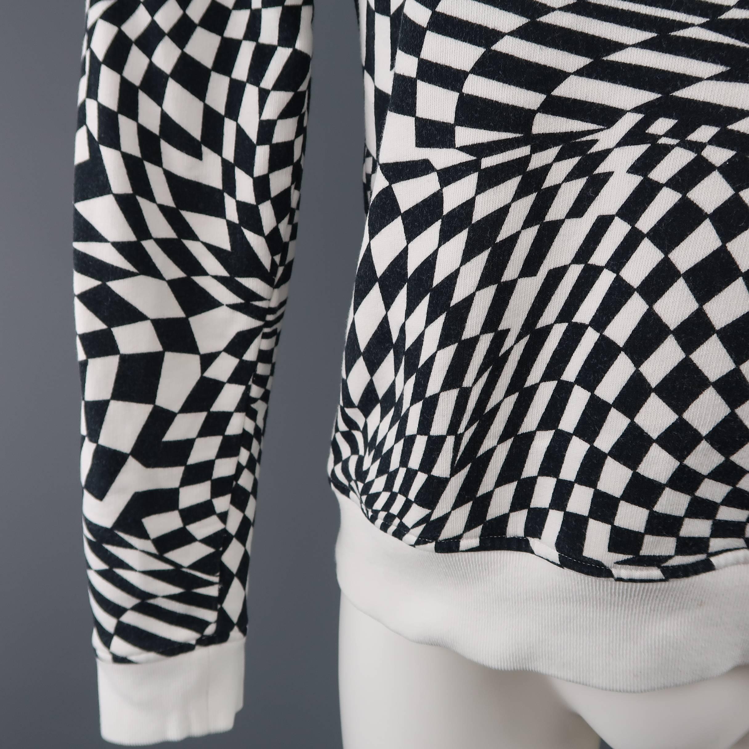 GARETH PUGH pullover comes in white cotton jersey with all over black warped checkered print with ribbed crewneck and cuffs. Wear and fading throughout.
 
Good Pre-Owned Condition.
Marked: (no tag)
 
Measurements:
 
Shoulder: 17 in.
Chest: 38