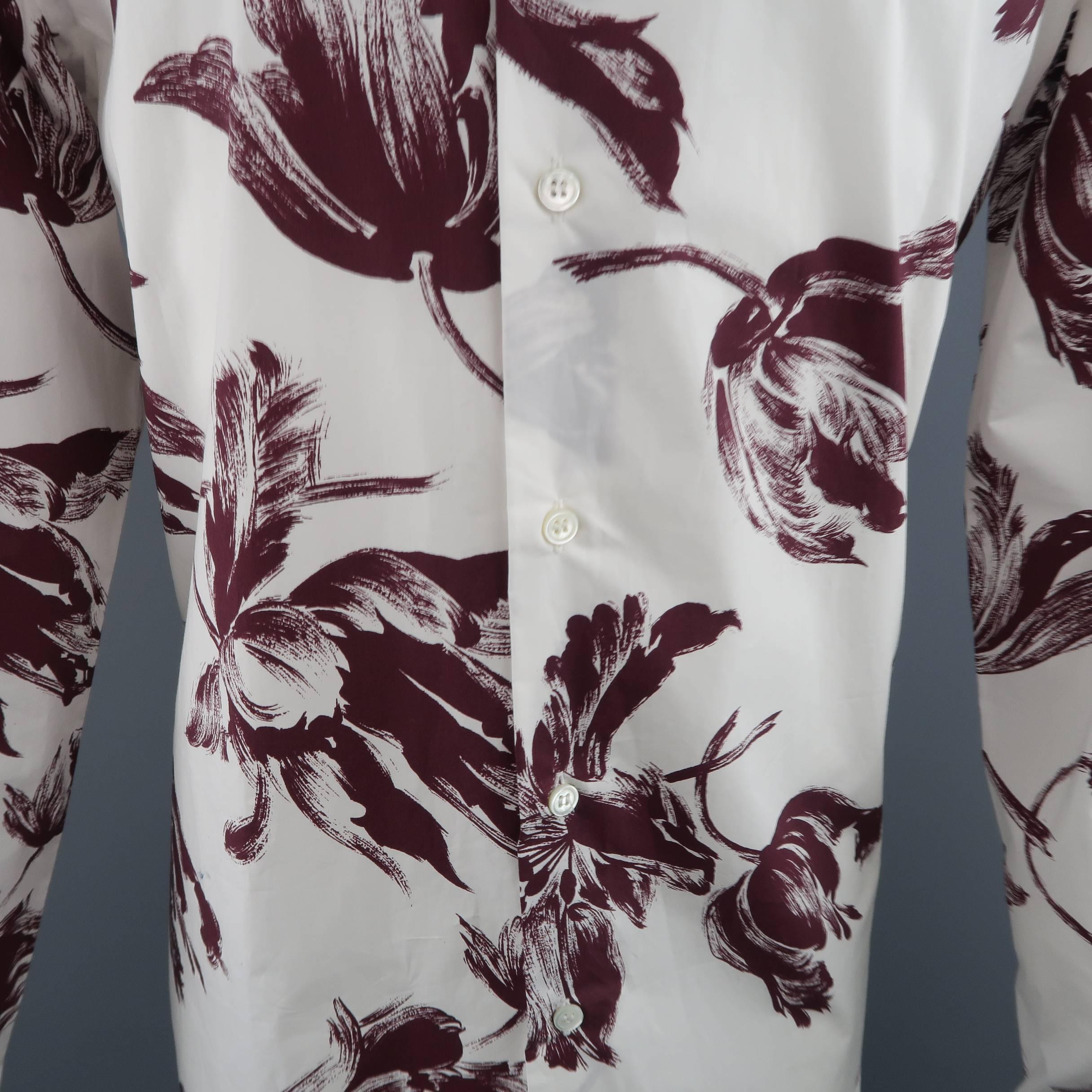 MARNI dress shirt comes in a light weight white cotton with all over brush stroke style burgundy floral print with classic fir and pointed collar. Made in Italy.
 
New with Tags.
Marked: IT 52
 
Measurements:
 
Shoulder: 18.5 in.
Chest: 46