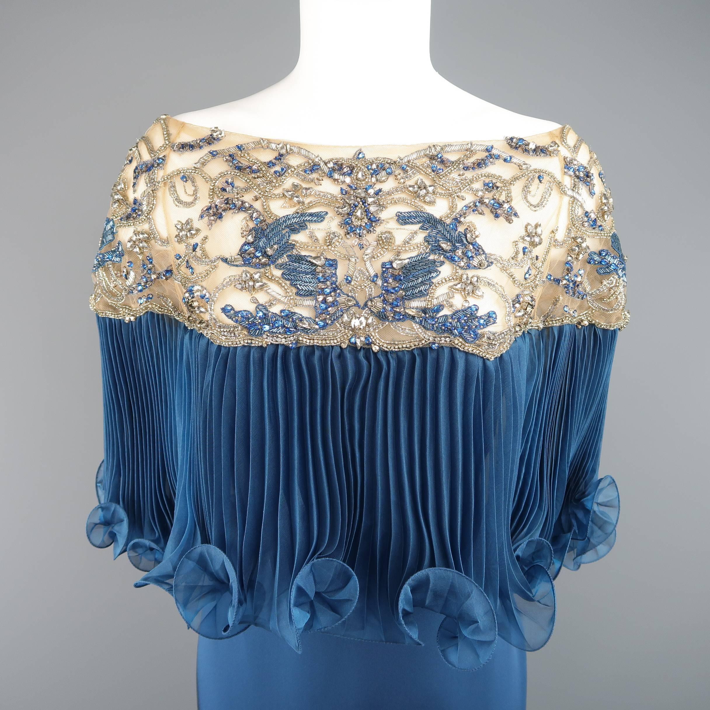 Marchesa cocktail dress features a beige mesh of the shoulder panel with silver and blue crystal beadwork, pleated ruffle capelet, and silk satin skirt.  Made in USA.
 
Excellent Pre-Owned Condition.
Marked: 10
 
Measurements:
 
Shoulder: 14