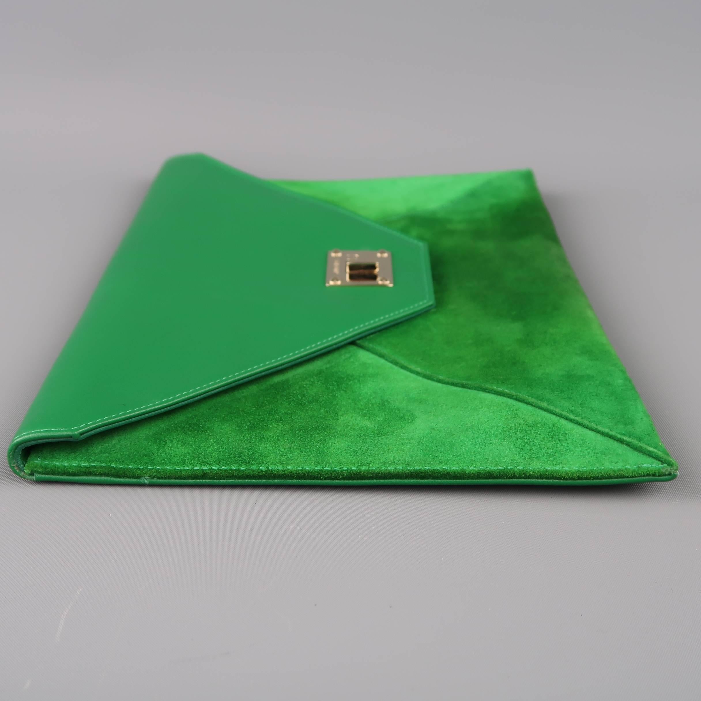 green leather clutch