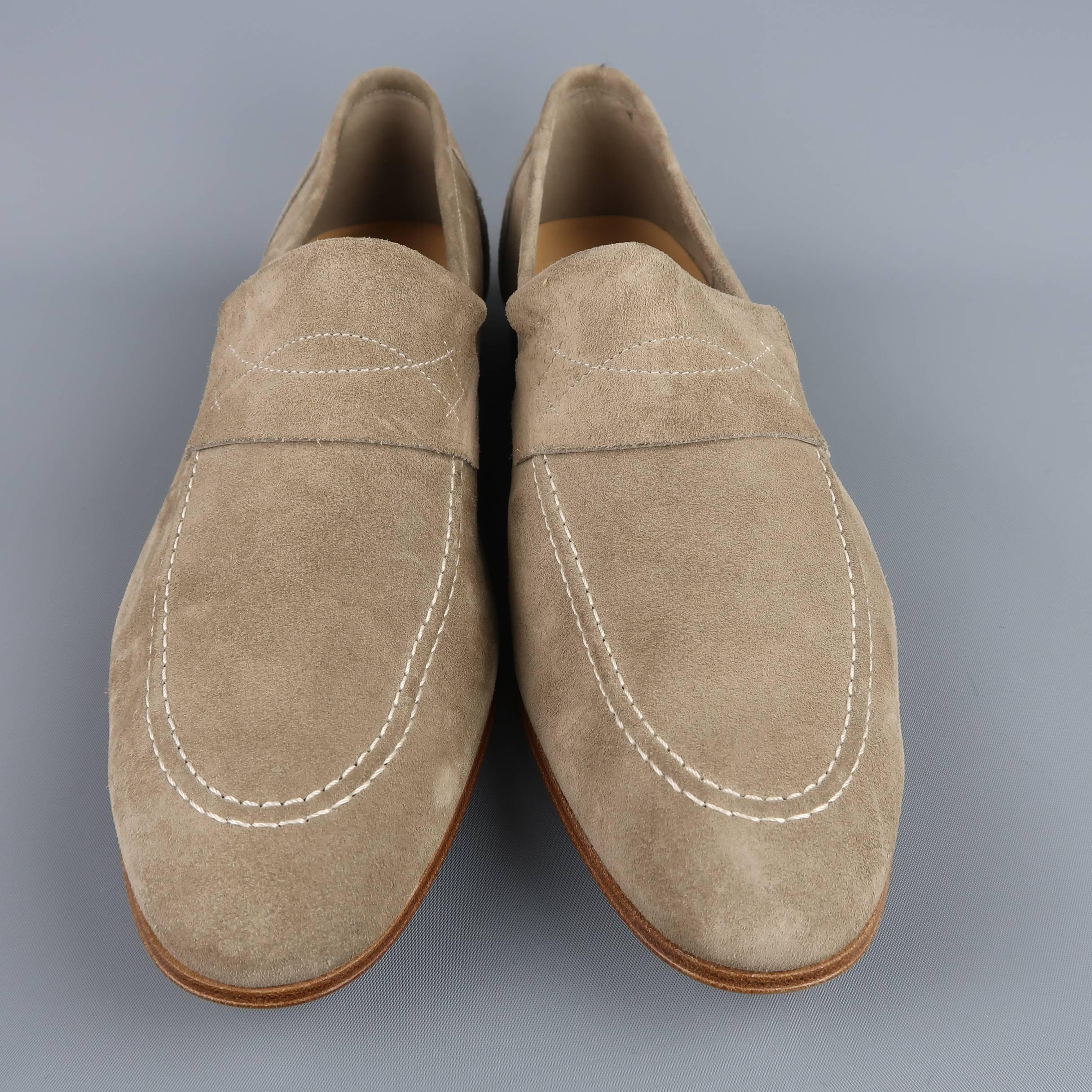 JOHN LOBB "YARDLEY" loafers come in light taupe gray suede with a rounded point toe, contrast top stitching, and tan stacked leather heel. With box. Made in Italy.
 
Brand New.  Retails: $745.00.
Marked: UK 9
 
Outsole: 11.75 x 4 in.
SKU: