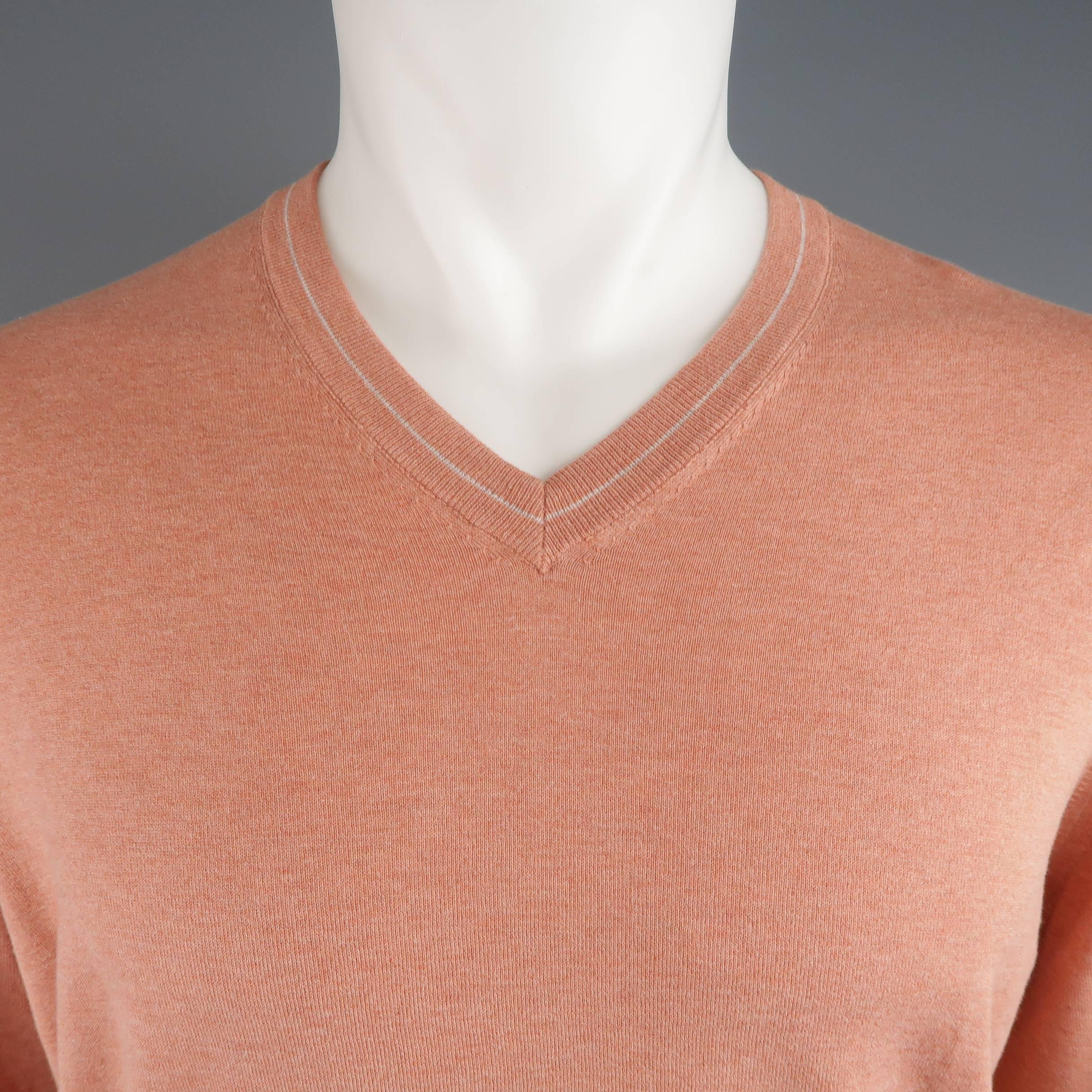 Classic BRUNELLO CUCINELLI pullover sweater comes in a heather textured, muted salmon pink, light weight cotton knit with a gray striped V neck. Made in Italy.
 
Excellent Pre-Owned Condition.
Marked: IT 48
 
Measurements:
 
Shoulder: 19 in.
Chest: