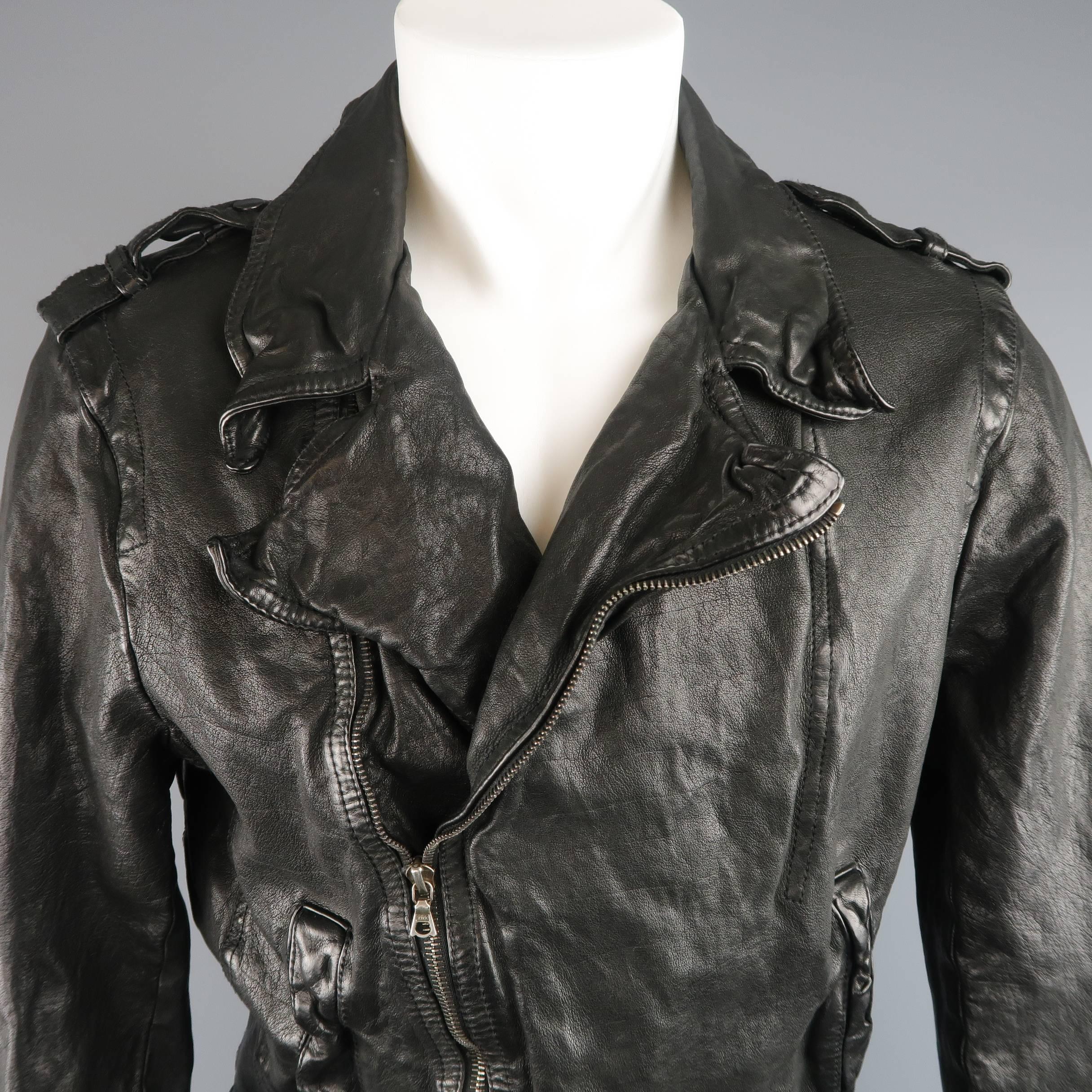 NEIL BARRETT biker jacket comes in a wrinkle distressed buffalo leather and features an asymmetrical zip front, pointed collar lapels, epaulets, snap pockets, zip cuffs, and back tabs. Made in Italy.
 
Excellent Pre-Owned Condition. Retails: