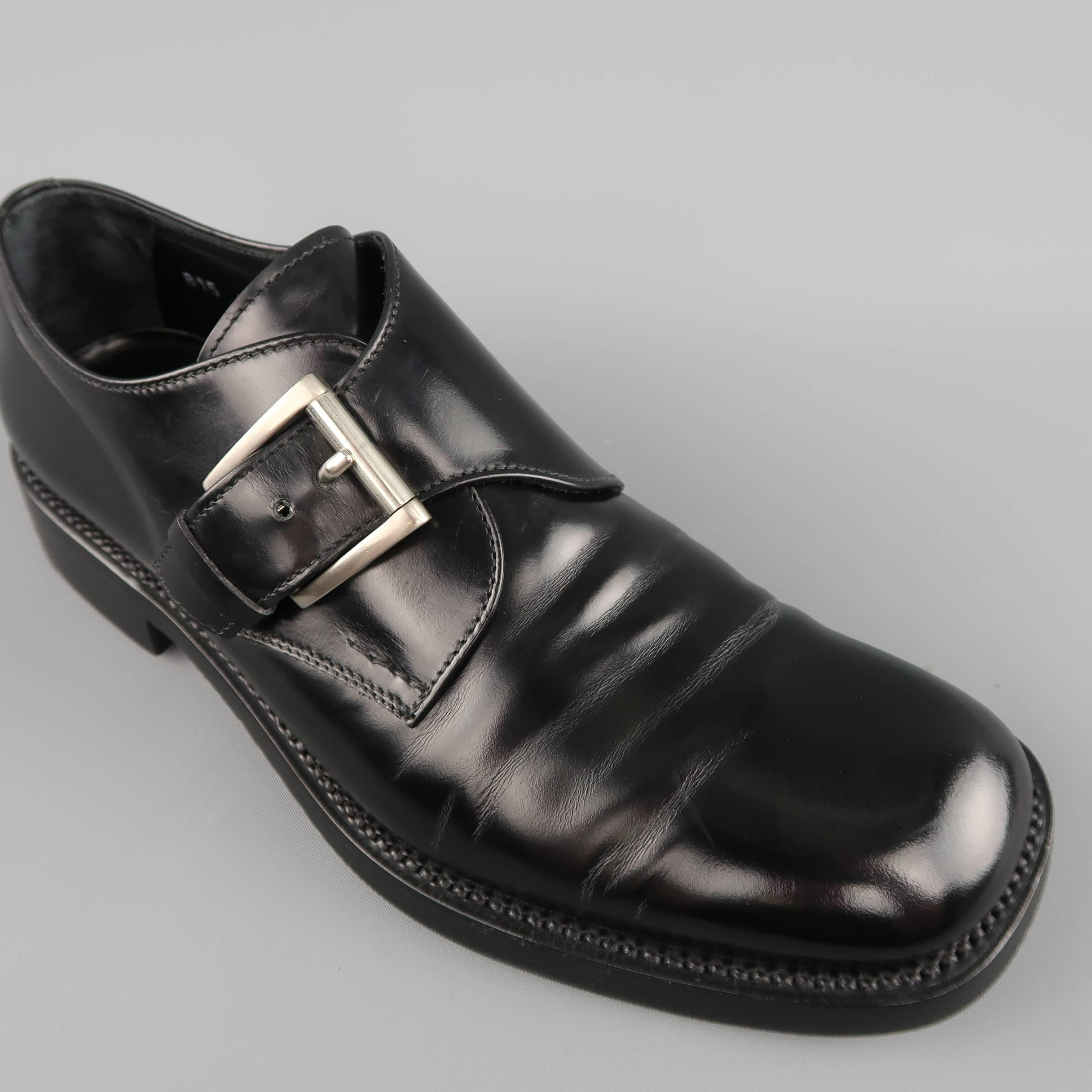 PRADA dress dress comes in a semi matte patent leather with a square toe and single monk strap. Resoled. Made in Italy.
 
Good Pre-Owned Condition.
Marked: EU 7
 
Outsole: 11.75 x 4.5 in.
 
SKU: 84230