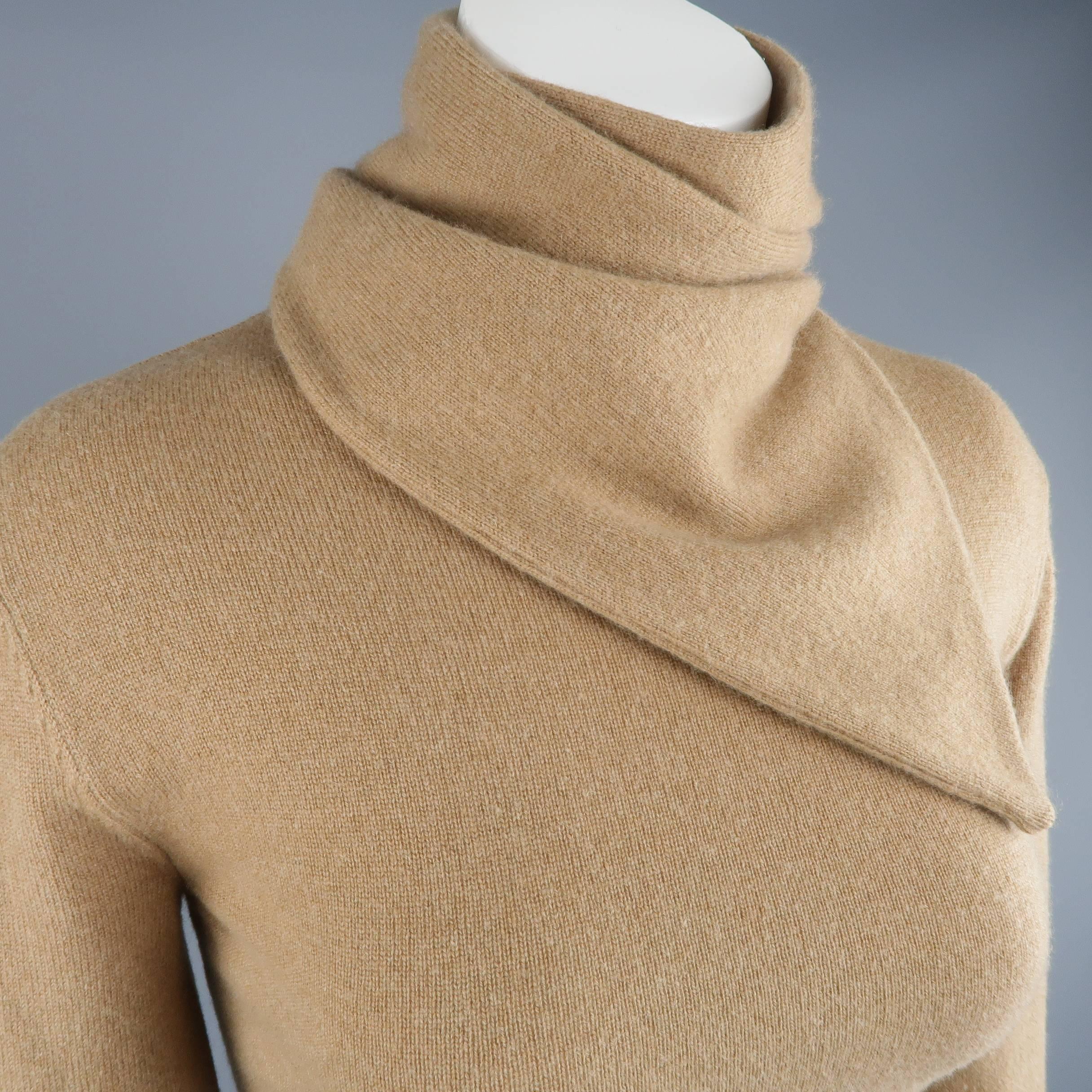 RALPH LAUREN COLLECTION pullover sweater comes in camel beige cashmere knit and features an asymmetrical wrap scarf neckline. Made in Italy.
 
Excellent Pre-Owned Condition.
Marked: M
 
Measurements:
 
Shoulder: 16.5 in.
Bust: 34 in.
Sleeve: 24