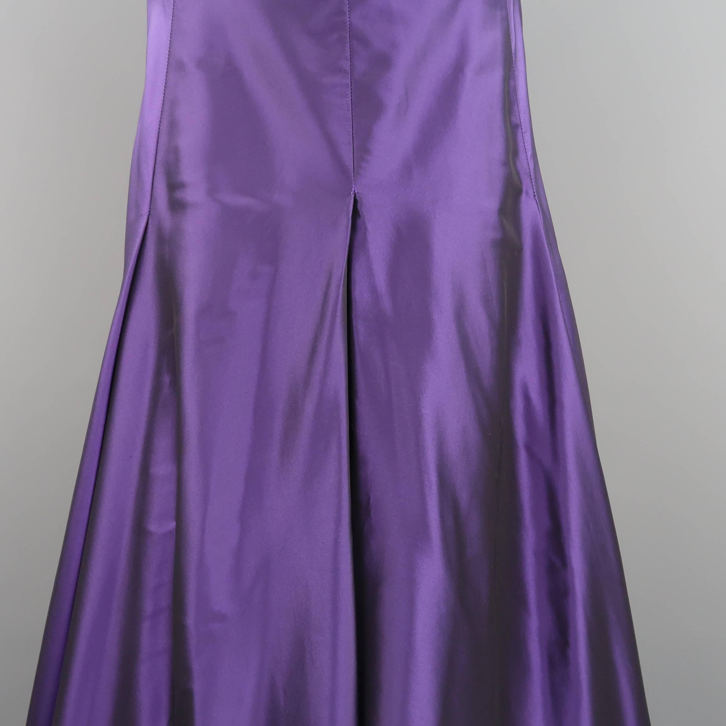 RALPH LAUREN COLLECTION evening skirt comes in a purple silk taffeta with an A line silhouette and box pleat construction. Minor wear through fabric. Made in USA.
 
Good Pre-Owned Condition.
Marked: 6
 
Measurements:
 
Waist: 31 in.
Hip: 48