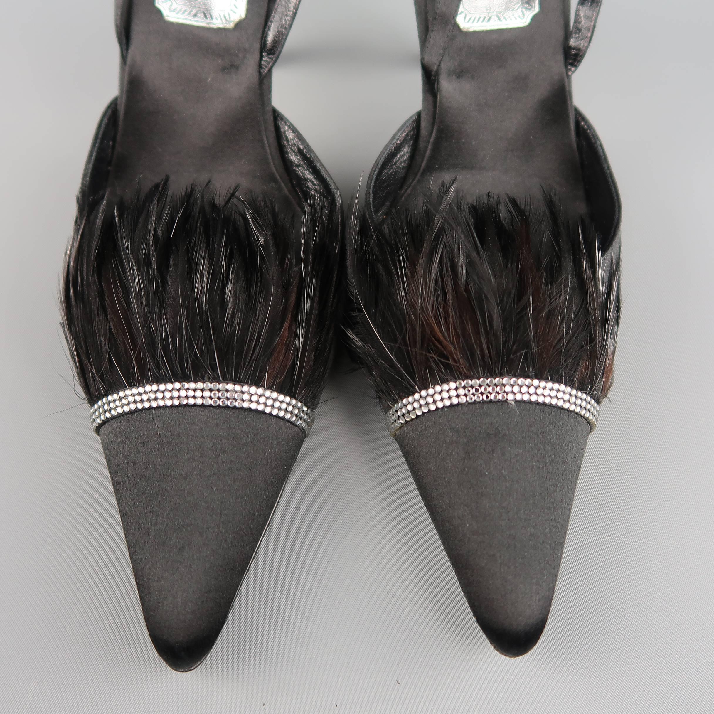 These fabulous evening pumps by RENE CAOVILLA slingback pumps come in black silk satin and feature a pointed toe with rhinestone and feather trim embellishment with a covered stiletto heel. Never worn. Made in Italy.
 
New without Tags.
Marked: IT