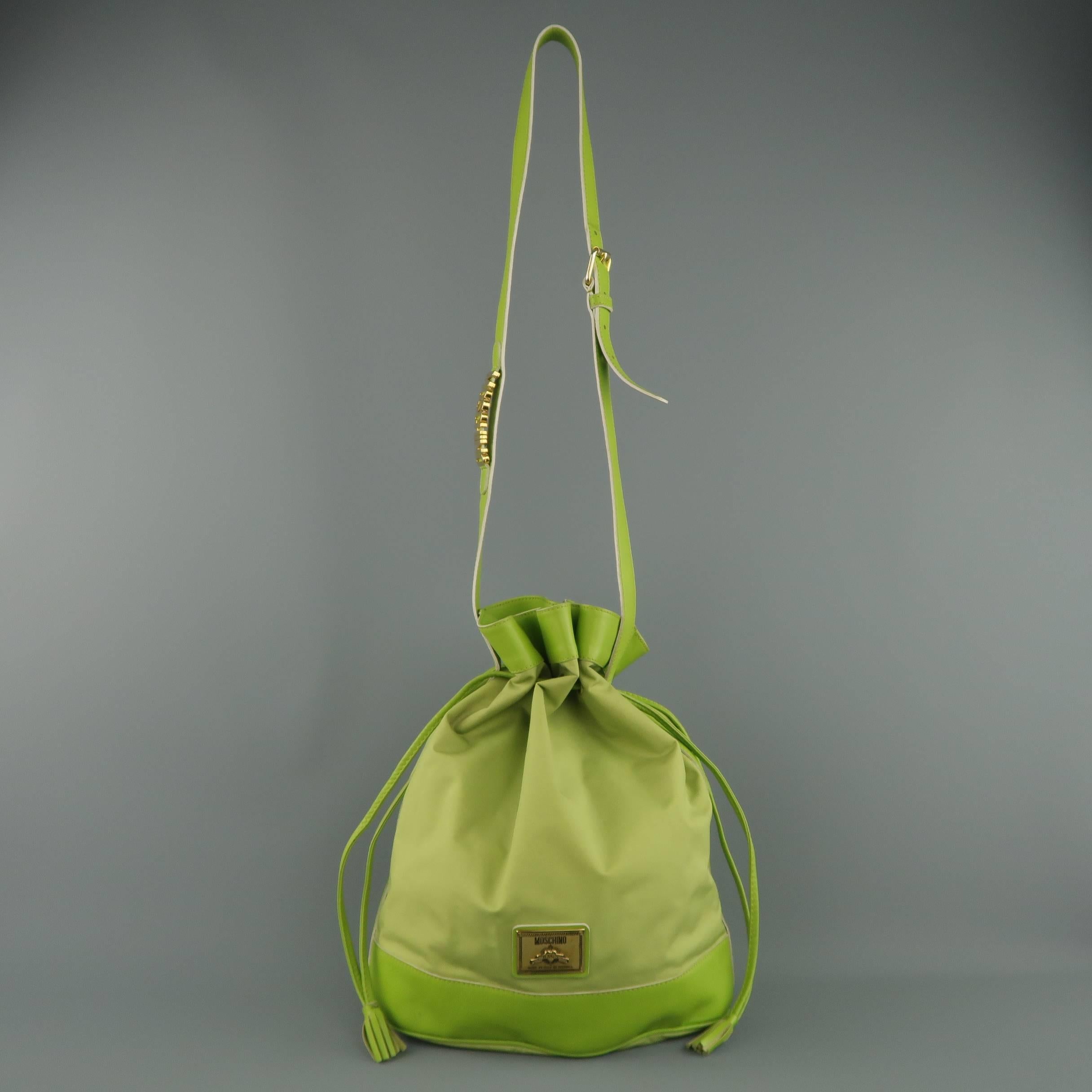 Vintage 1990s MOSCHINO Green Canvas Drawstring Bucket Handbag In Fair Condition In San Francisco, CA