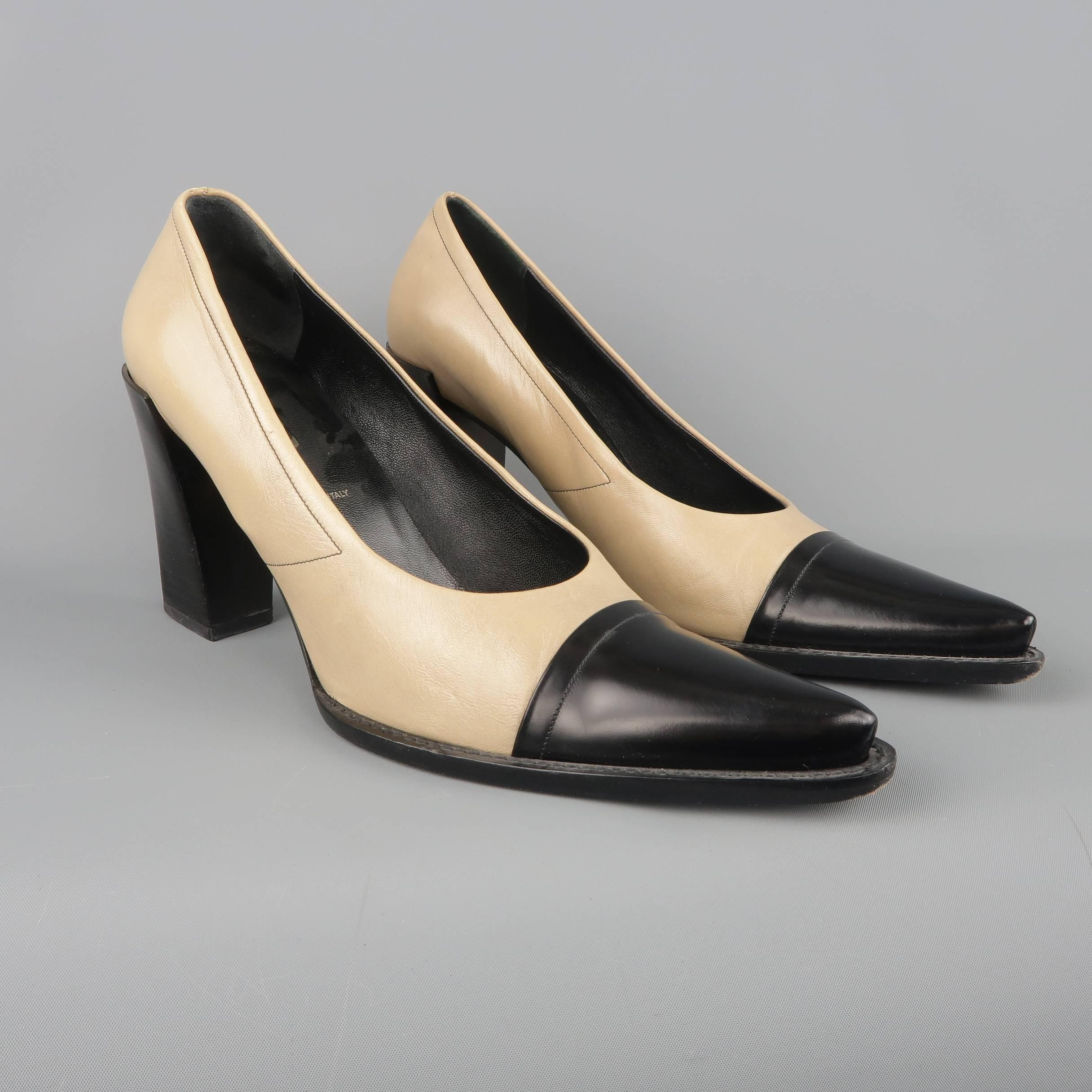 PRADA pumps come in a taupe beige and black leather and feature a pointed cap toe and stacked chunky heel. Minor wear. Made in Italy.
 
Good Pre-Owned Condition.
Marked: IT 40
 
Heel: 3 in.

SKU: 87208
