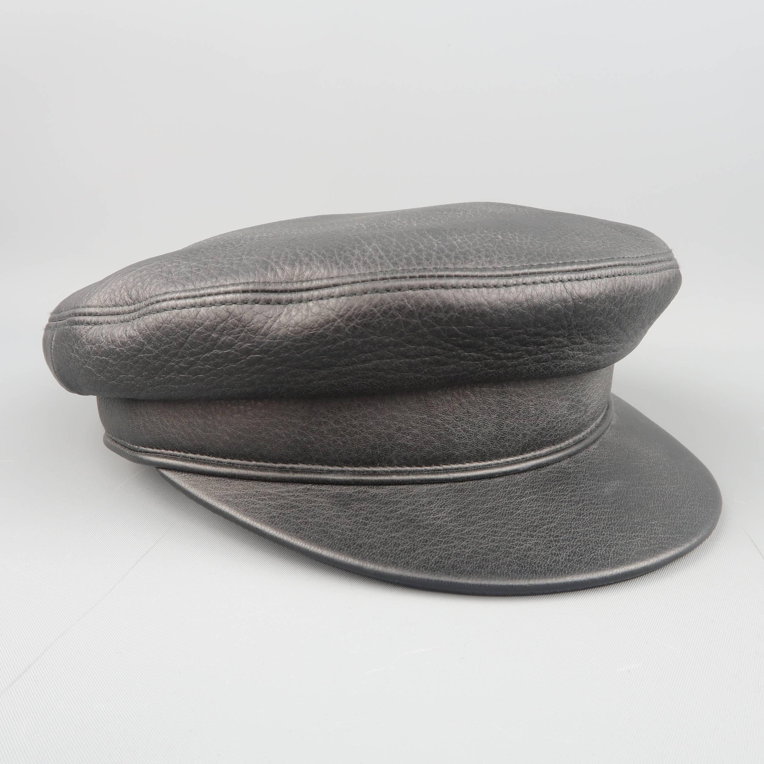HERMES biker style cap comes in deer skin leather and features a beret top, thick band and small brim. Never worn. With original box. Made in France.
 
New without Tags.
Marked: EU 57
 
Measurements:
 
Opening: 7 x 7.5 in.
Brim: 2.25 in.
Height: