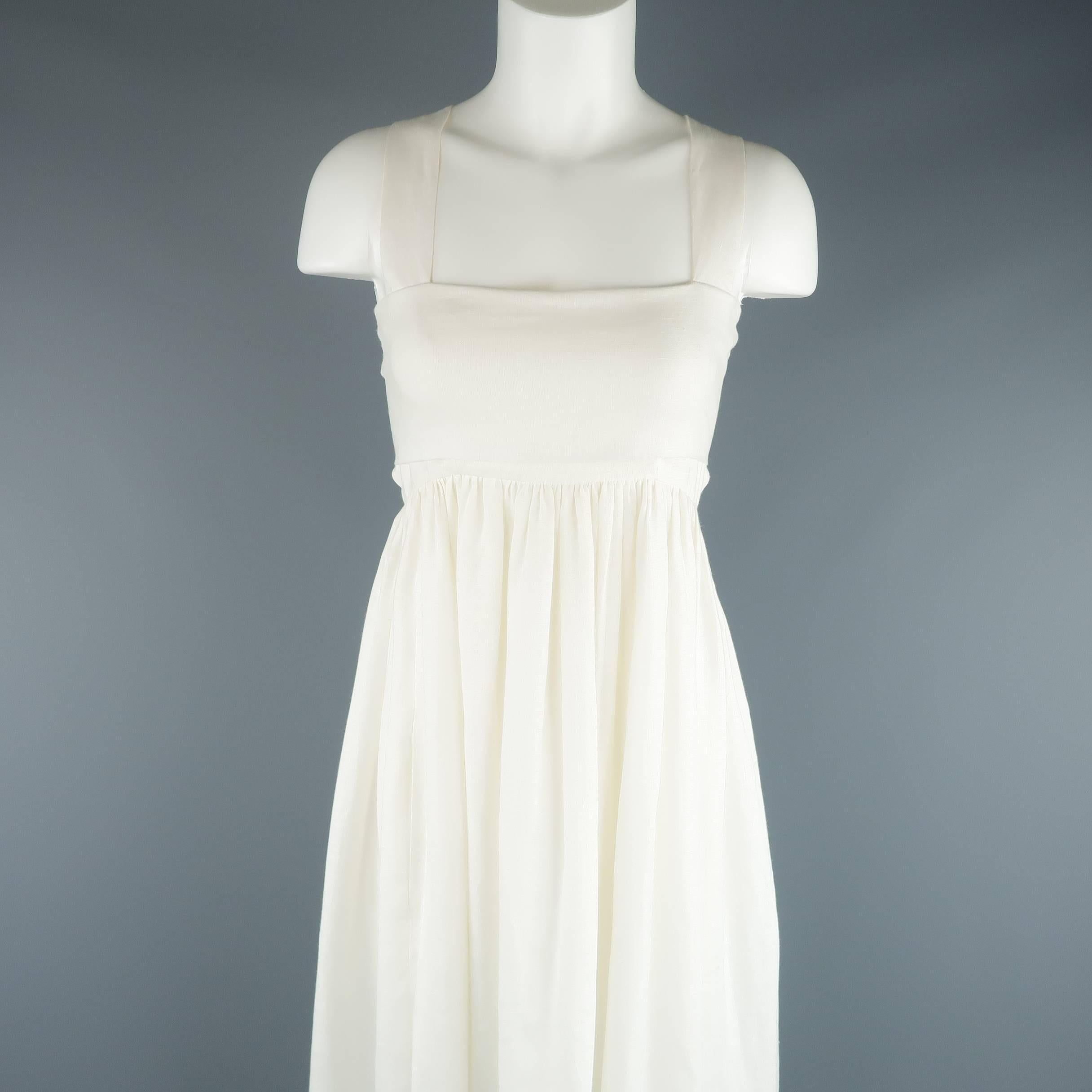 CHLOE peasant style maxi dress comes in cream linen and features a folded panel bustline that ties in the back, empire waistline, back cutouts, and maxi skirt with ruffled hem.
 
Excellent Pre-Owned Condition.
Marked: EU 34
 
Measurements:
