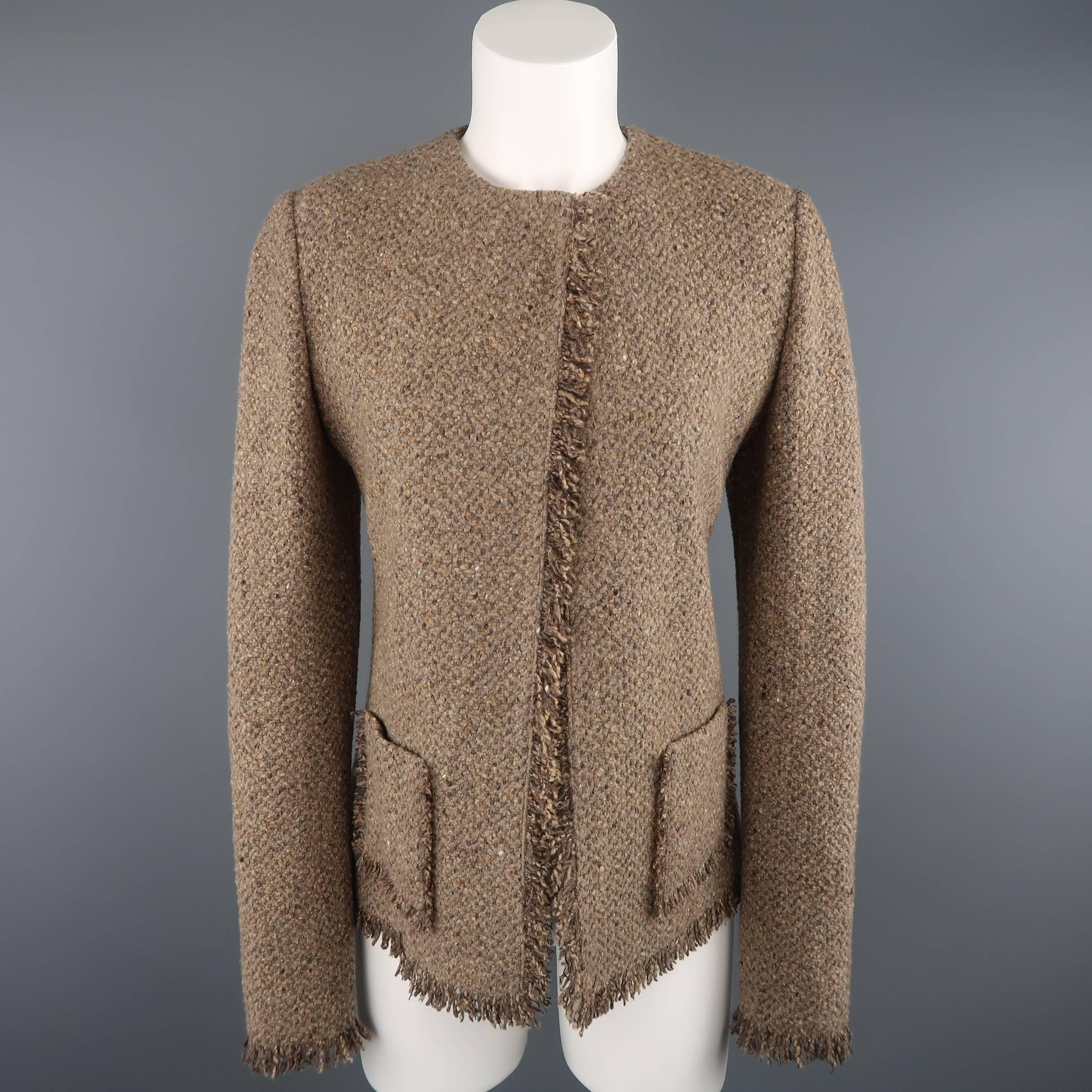 This Ralph Lauren Collection set comes in a taupe beige wool and cashmere blend fringe trimmed Donegal tweed and includes a jacket with round 