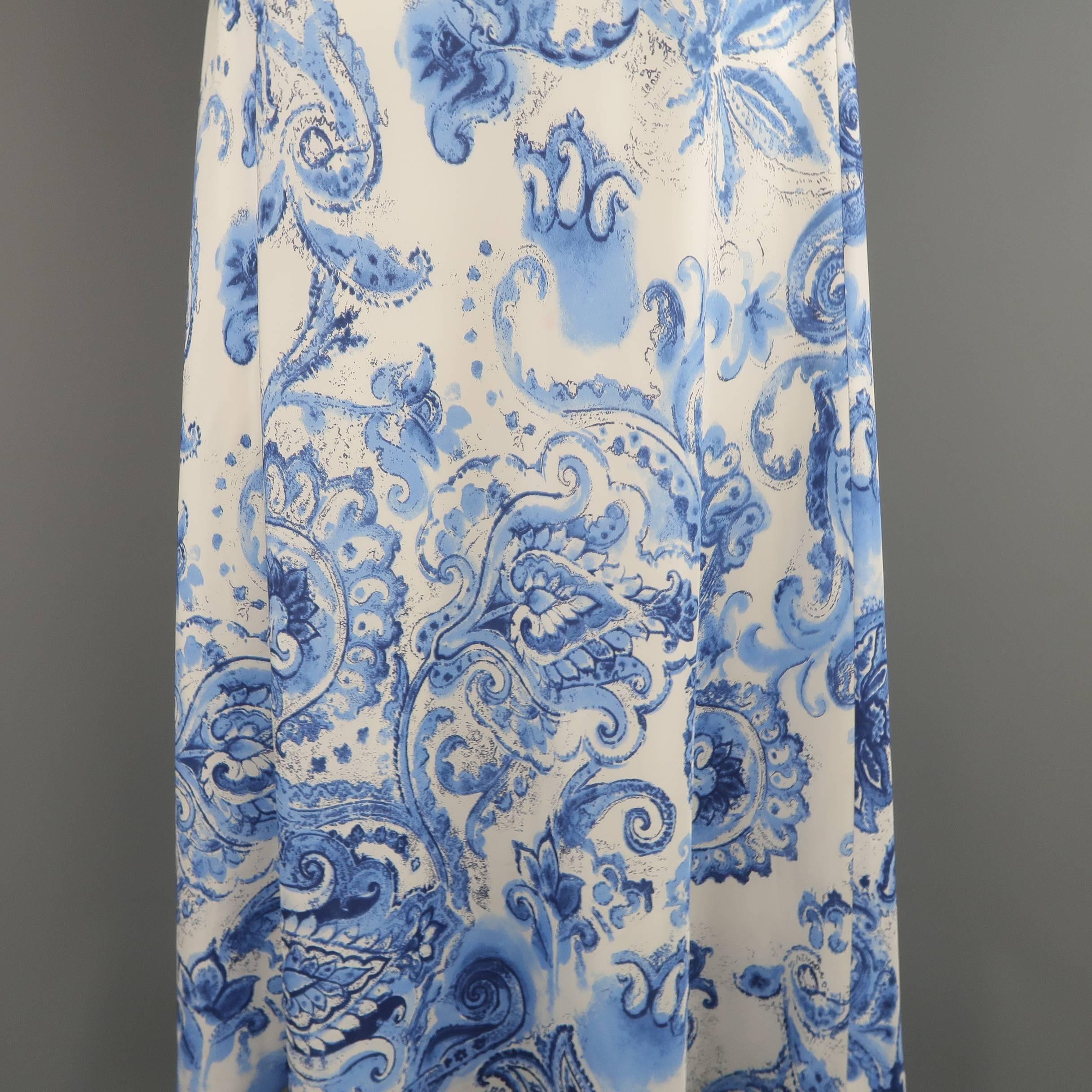 RALPH LAUREN BLACK LABEL maxi skirt comes in white and blue floral paisley print silk satin and features a side zip, dart panels, and ruffled hem.
 
Good Pre-Owned Condition.
Marked: 6
 
Measurements:
 
Waist: 29 in.
Hip: 48 in.
Length: 40 in.
