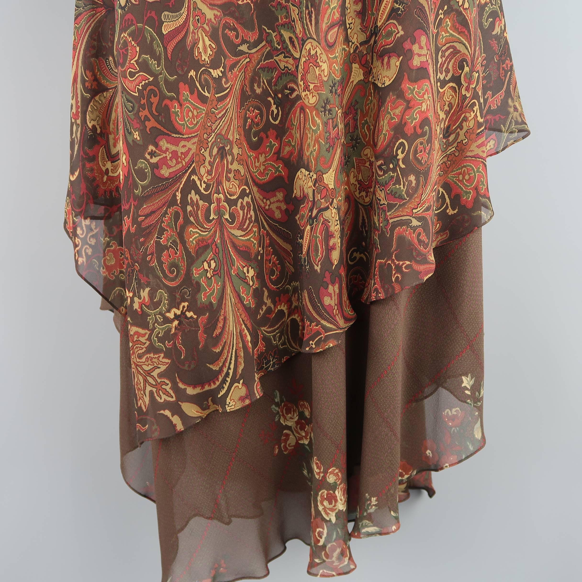RALPH LAUREN BLACK LABEL maxi skirt comes in brown and dark red paisley print silk chiffon and features cascading asymmetrical ruffled layers with a floral and plaid liner.
 
Excellent Pre-Owned Condition.
Marked: 10
 
Measurements:
 
Waist: 34
