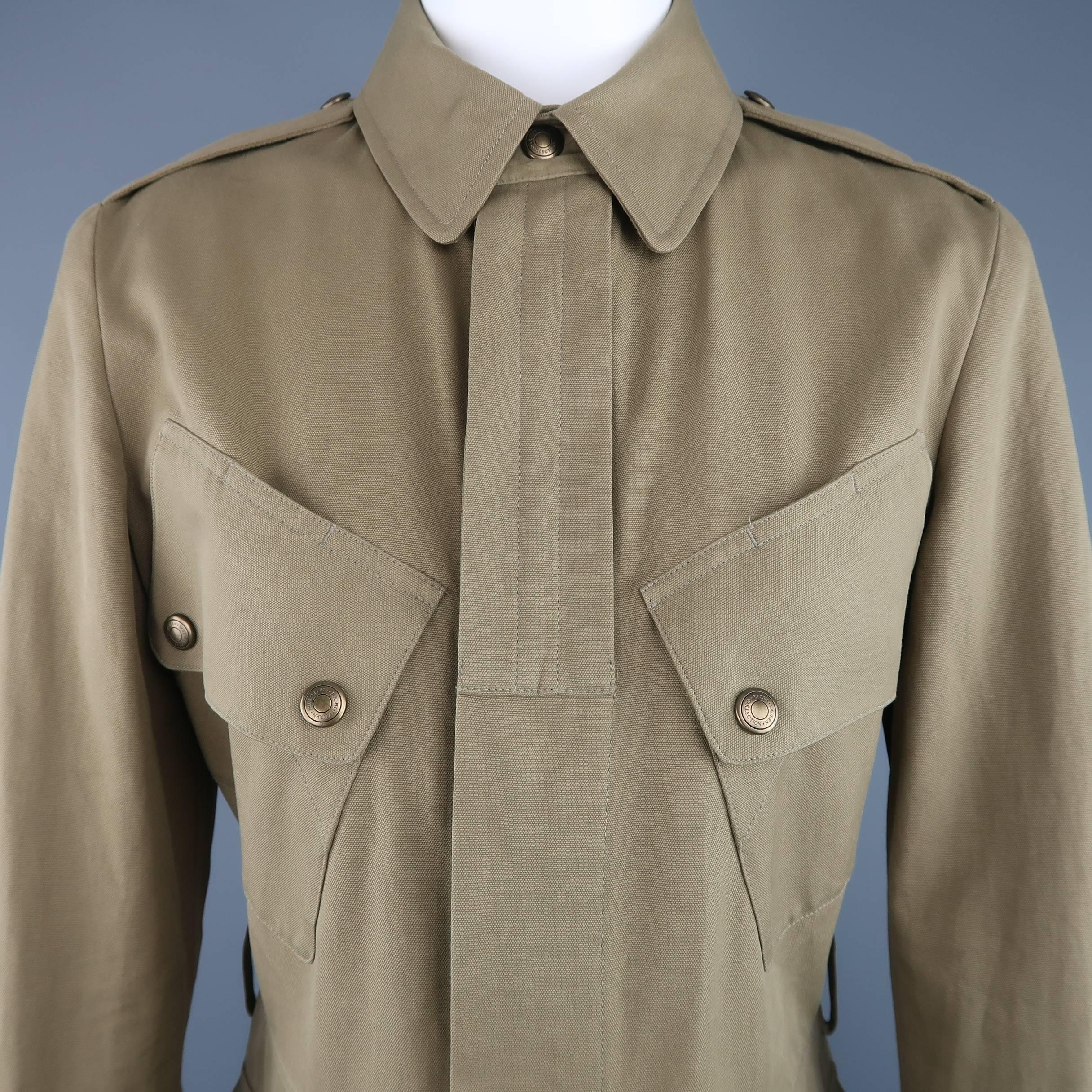Ralph Lauren Collection safari jacket comes in olive green cotton canvas and features a classic pointed collar, epaulets, hidden placket zip front, slanted patch flap pockets, snap cuffs, and pleated back. Missing belt. As-is.  Made in Italy.
 
Good