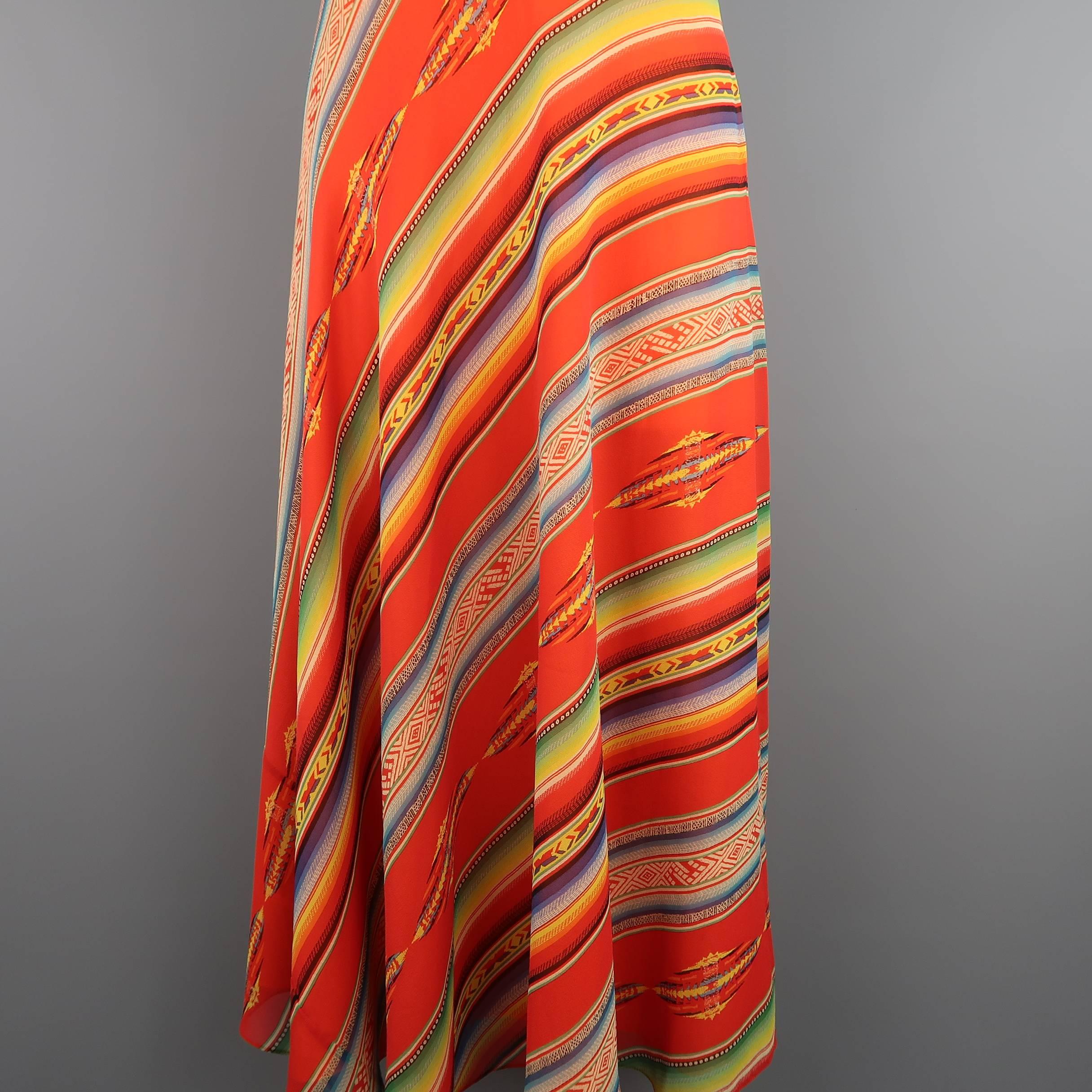 RALPH LAUREN maxi skirt comes in a vibrant orange red silk chiffon with all over multi-color Mexican Serape blanket print with asymmetrical panels and ruffled hem.
 
Excellent Pre-Owned Condition.
Marked: 6
 
Measurements:
 
Waist: 30 in.
Hip: 60