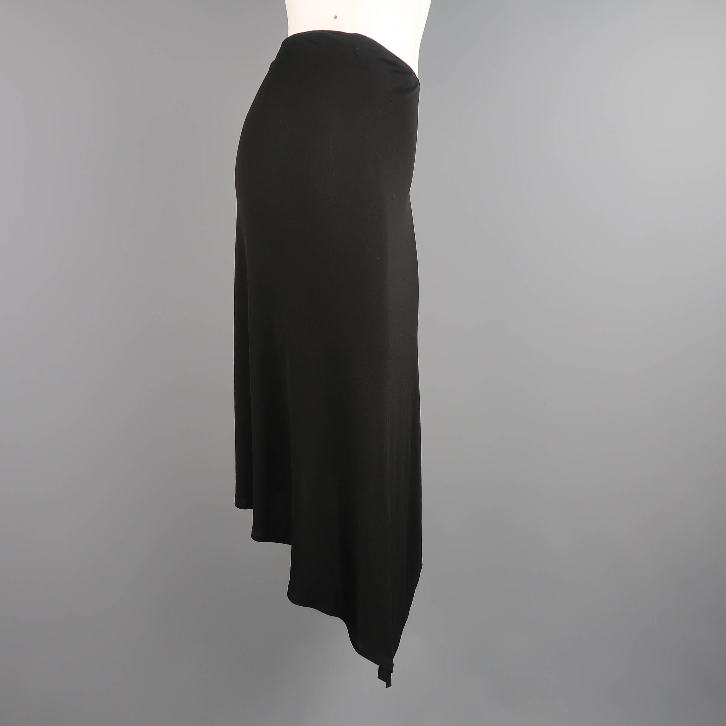 JEAN PAUL GAULTIER skirt comes in a semi sheer rayon material and features an A line silhouette and asymmetrical pointed front, short back hem line.  Made in Italy.
 
Excellent Pre-Owned Condition.
Marked: 10
 
Measurements:
 
Waist: 30 in.
Hip: 35