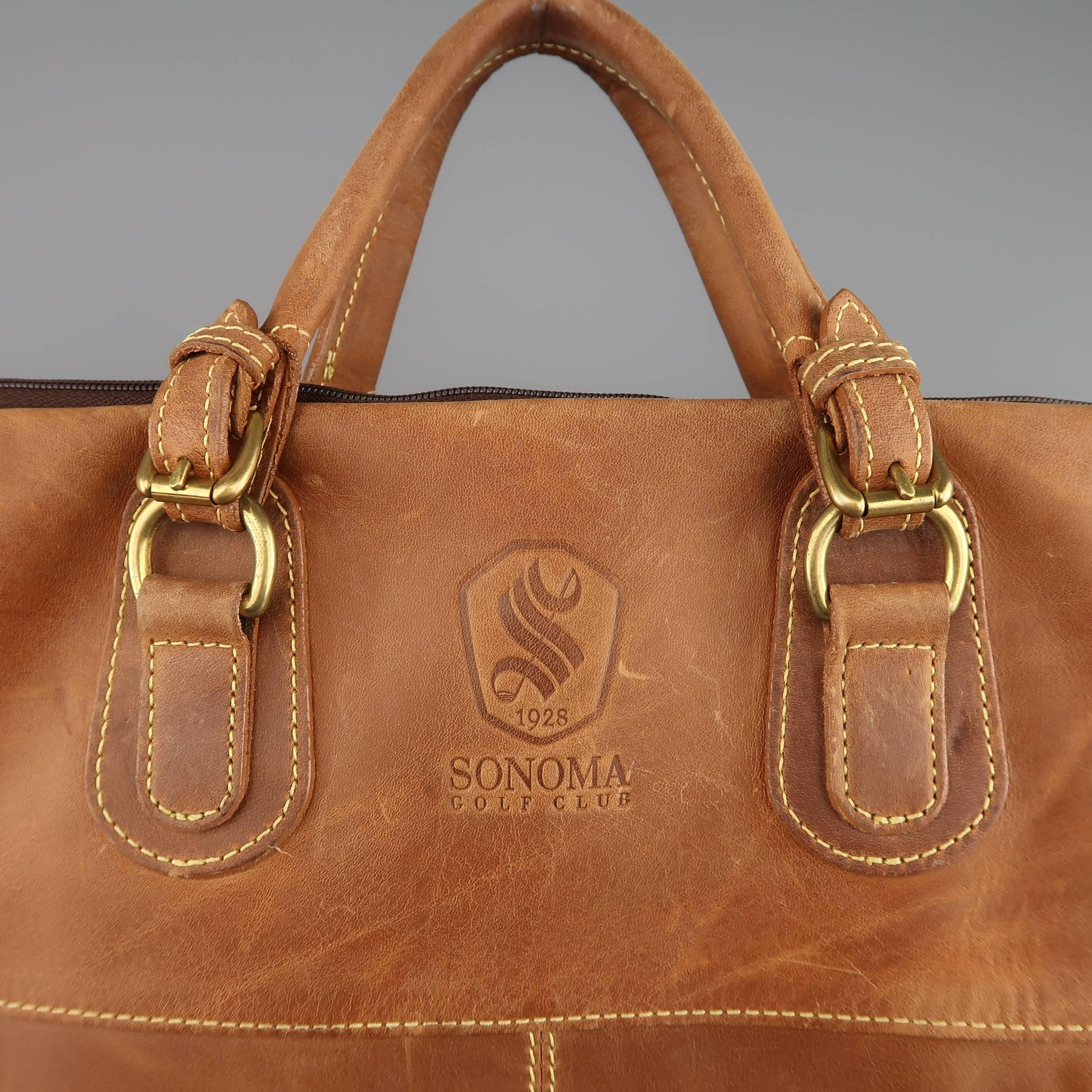 tan garment bag