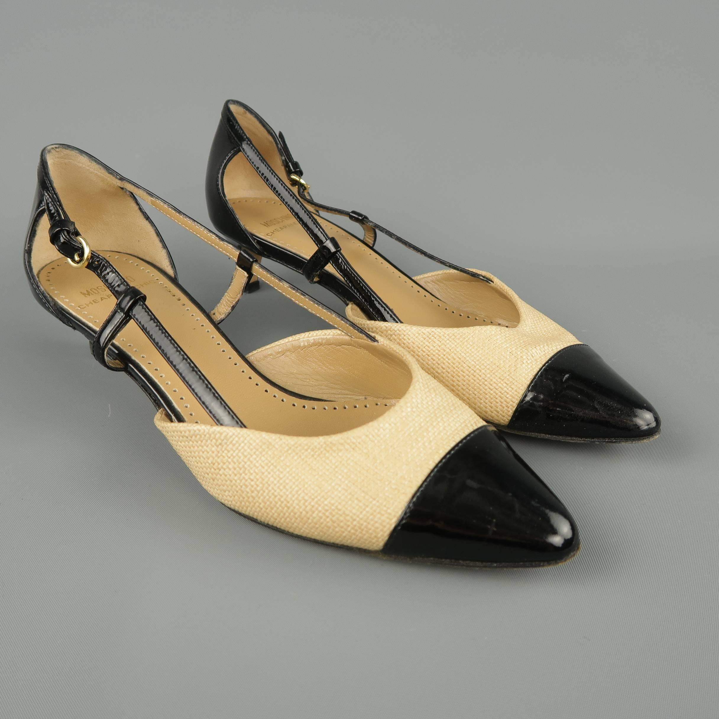 MOSCHINO CHEAP & CHIC pumps come in beige woven fabric with a pointed toe, black patent leather strap sides, and kitten heel. Made in Italy.
 
Good Pre-Owned Condition.
Marked: IT 37
 
Measurements:
 
Heel: 1 in.
