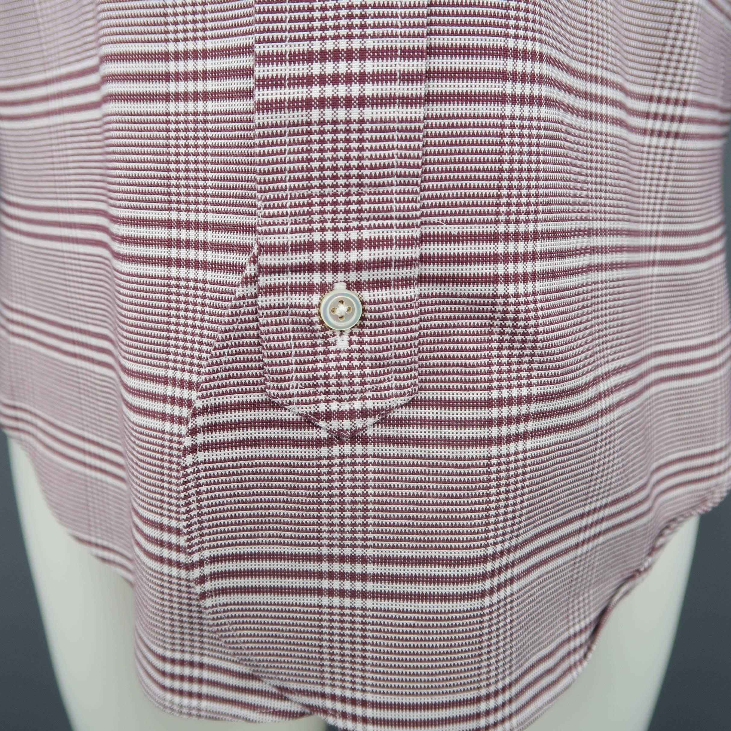 BLACK FLEECE by THOM BROWNE shirt comes in burgundy and white glenplaid print cotton with a pointed button down collar, patch breast pocket, curved hem detail, and back tab. Made in USA.
 
Excellent Pre-Owned Condition.
Marked: BB0
 
Measurements:

